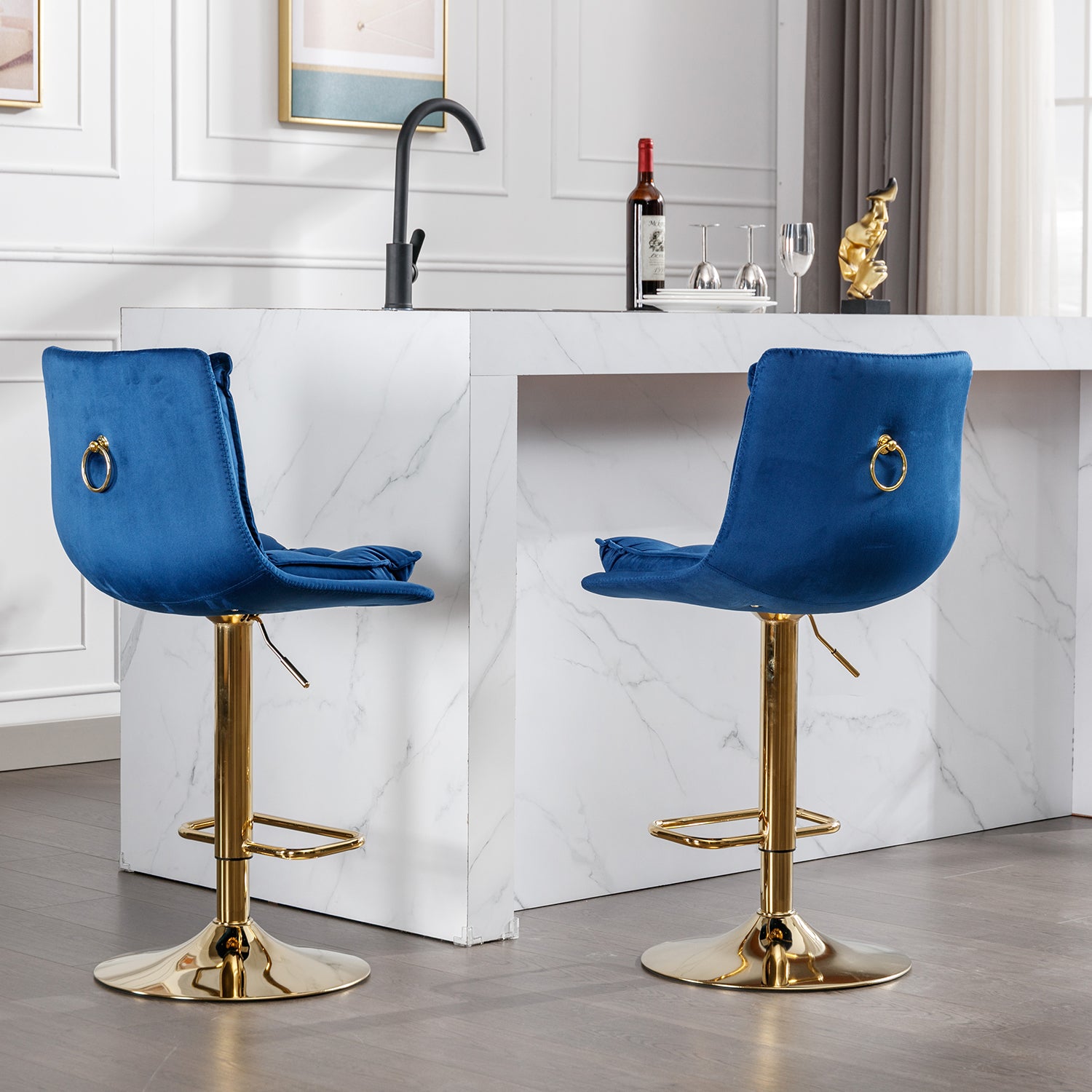 Adjustable royal blue velvet bar stool with gold ring accent and polished gold base