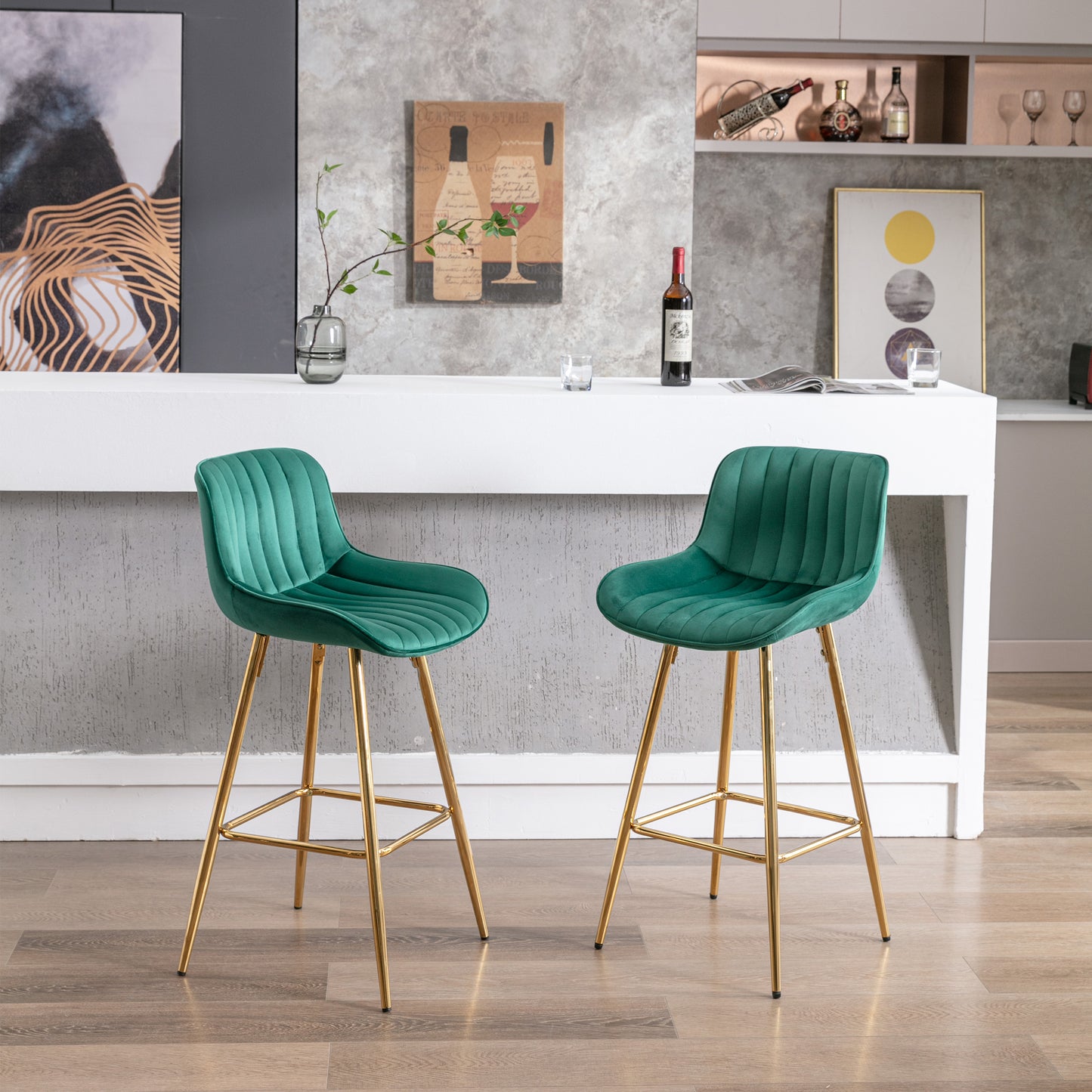 Emerald green velvet bar stool with gold legs and plush tufting