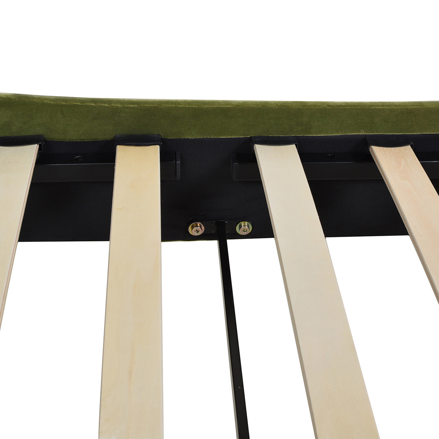 Closeup of green velvet bed frame upholstery with visible wooden slats and metal support structure