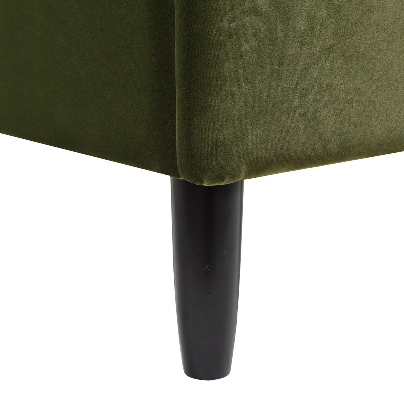 Close up of plush olive green velvet sofa leg