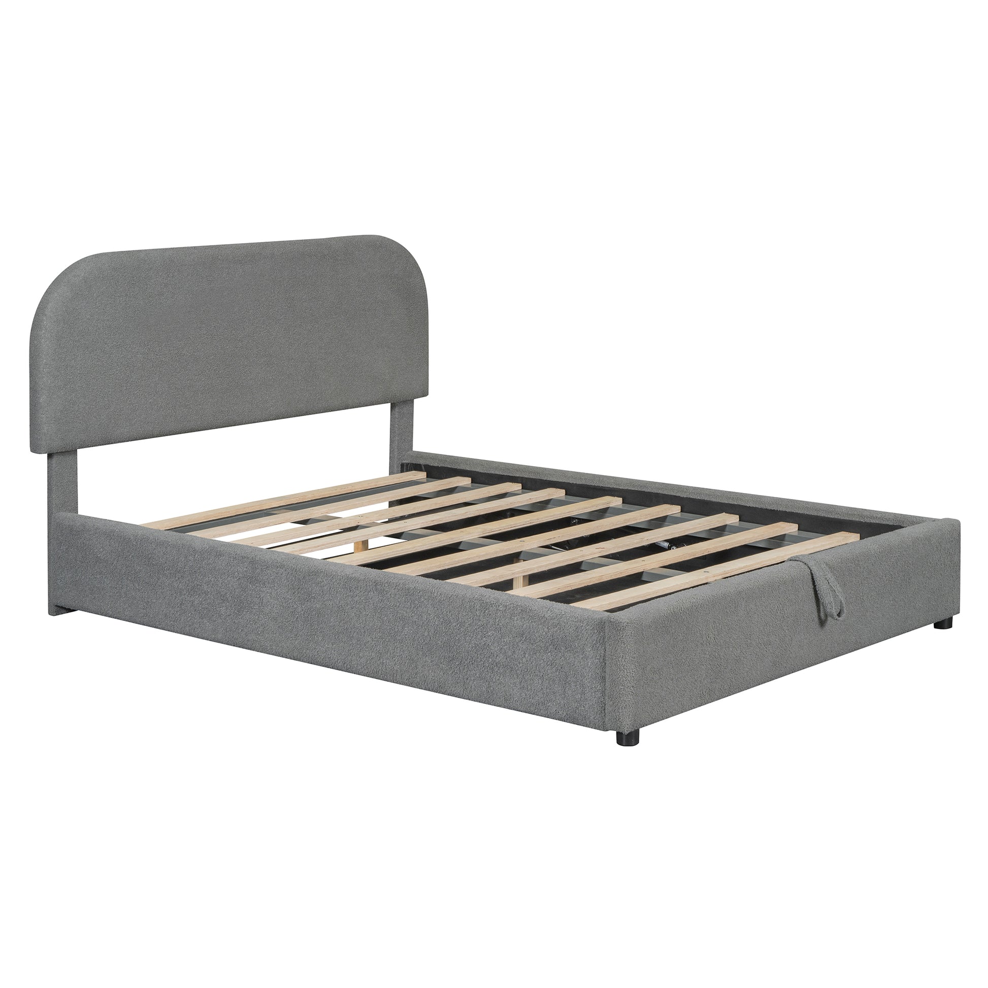 Gray upholstered bed frame with arched headboard and wooden slats
