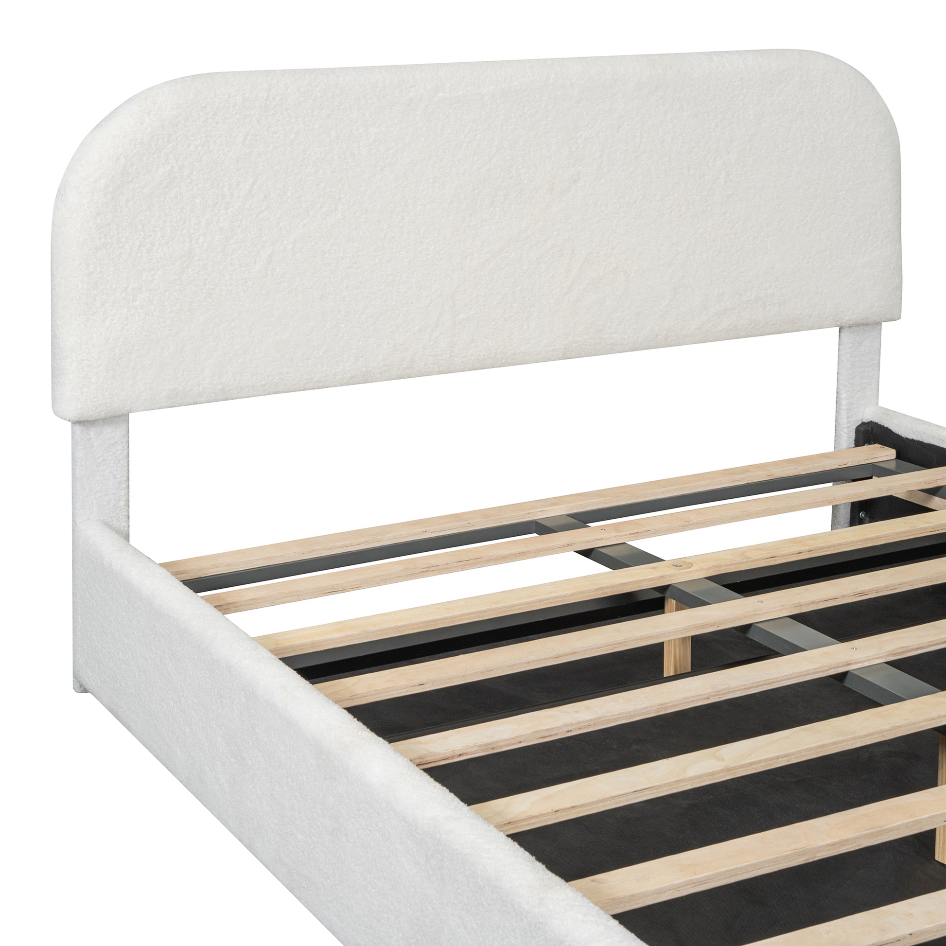White boucle upholstered bed frame with curved headboard and wooden slats