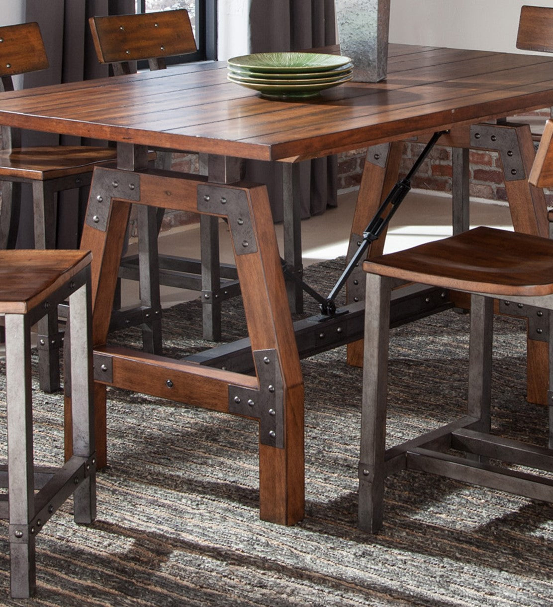 Industrial dining table with reclaimed wood top and metal frame