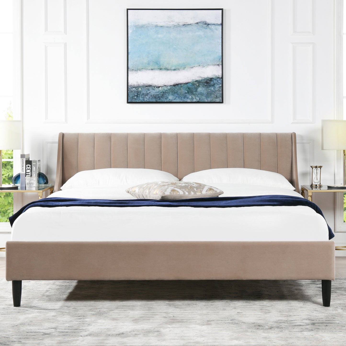 Taupe upholstered platform bed frame with vertical channel tufting on the headboard