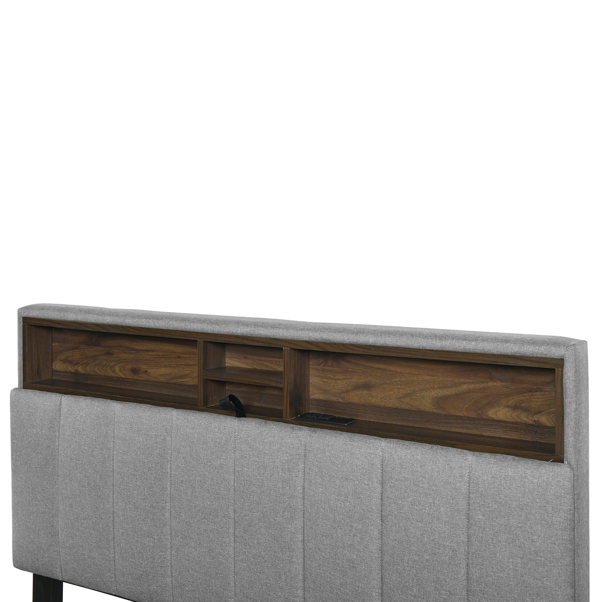 Gray upholstered headboard with builtin walnut wood storage shelves and charging port