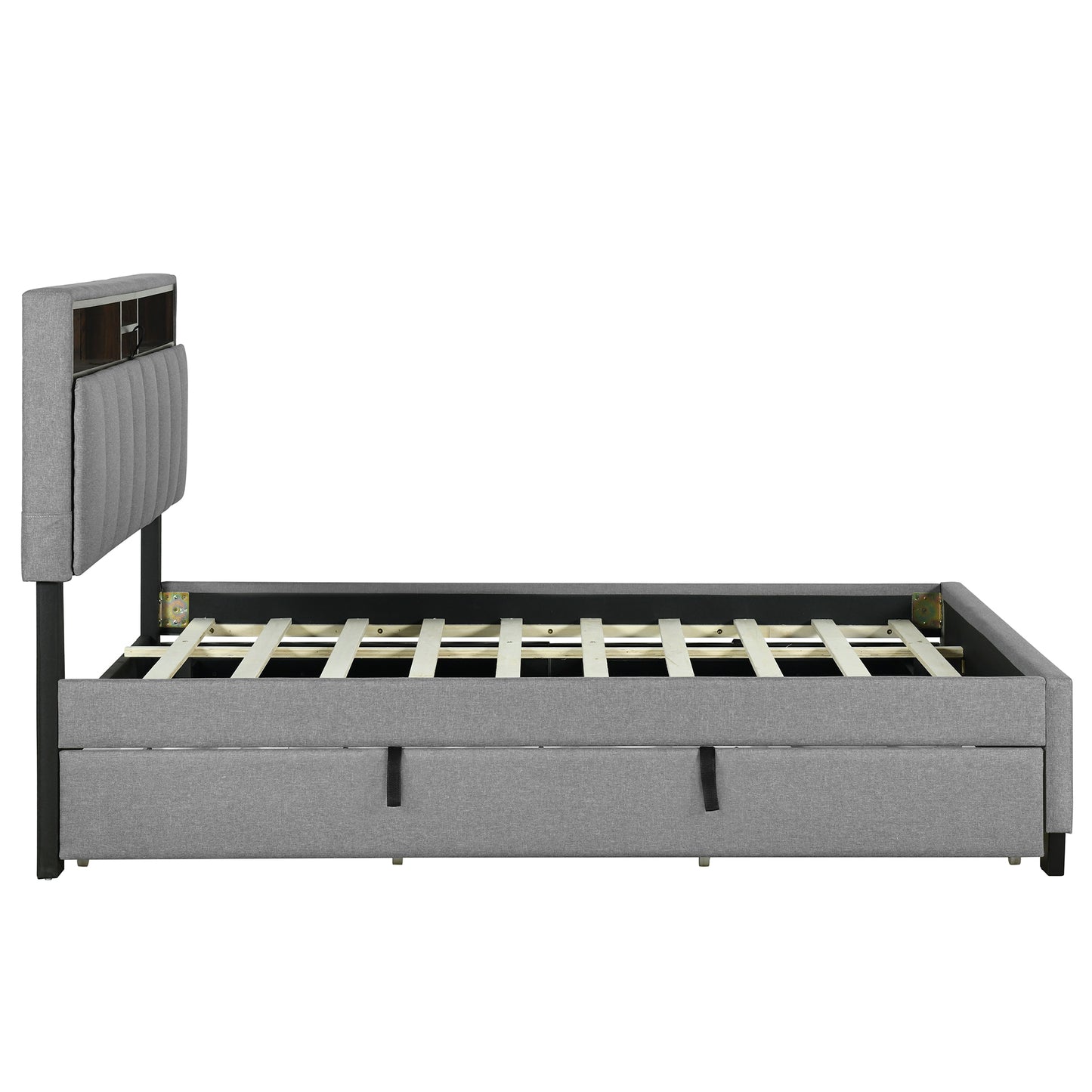 Grey upholstered platform bed frame with storage drawers and builtin headboard shelf