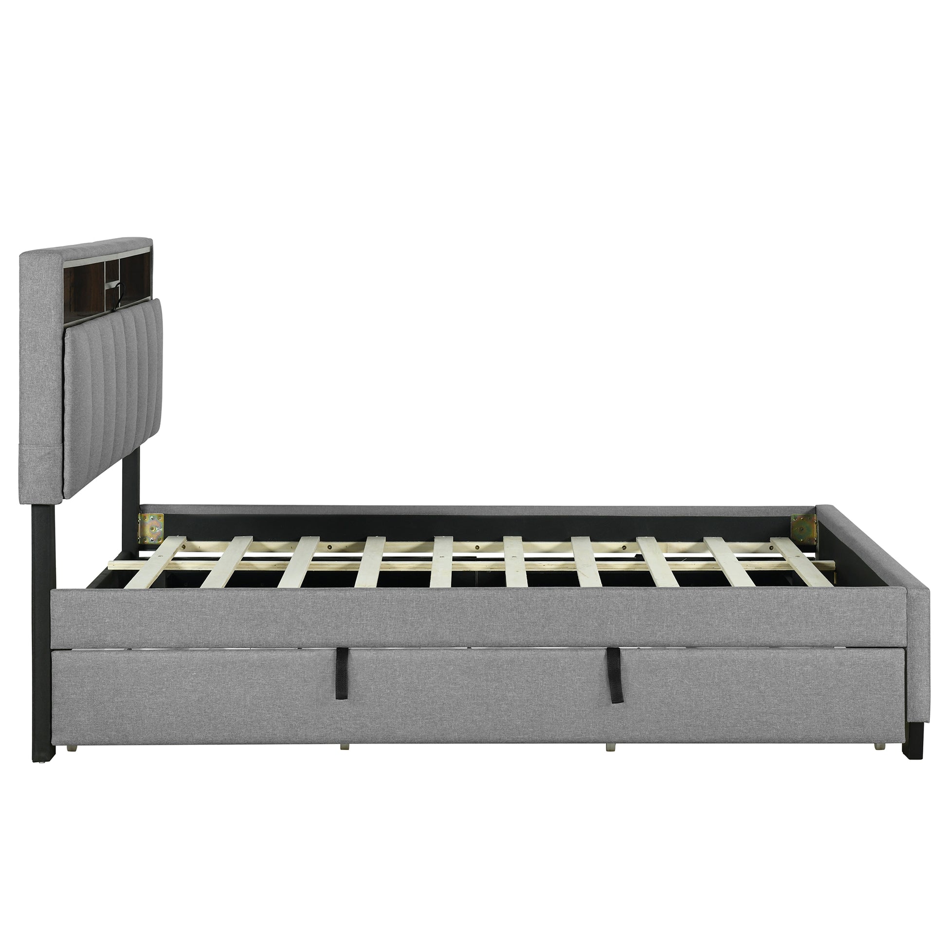 Grey upholstered platform bed frame with storage drawers and builtin headboard shelf