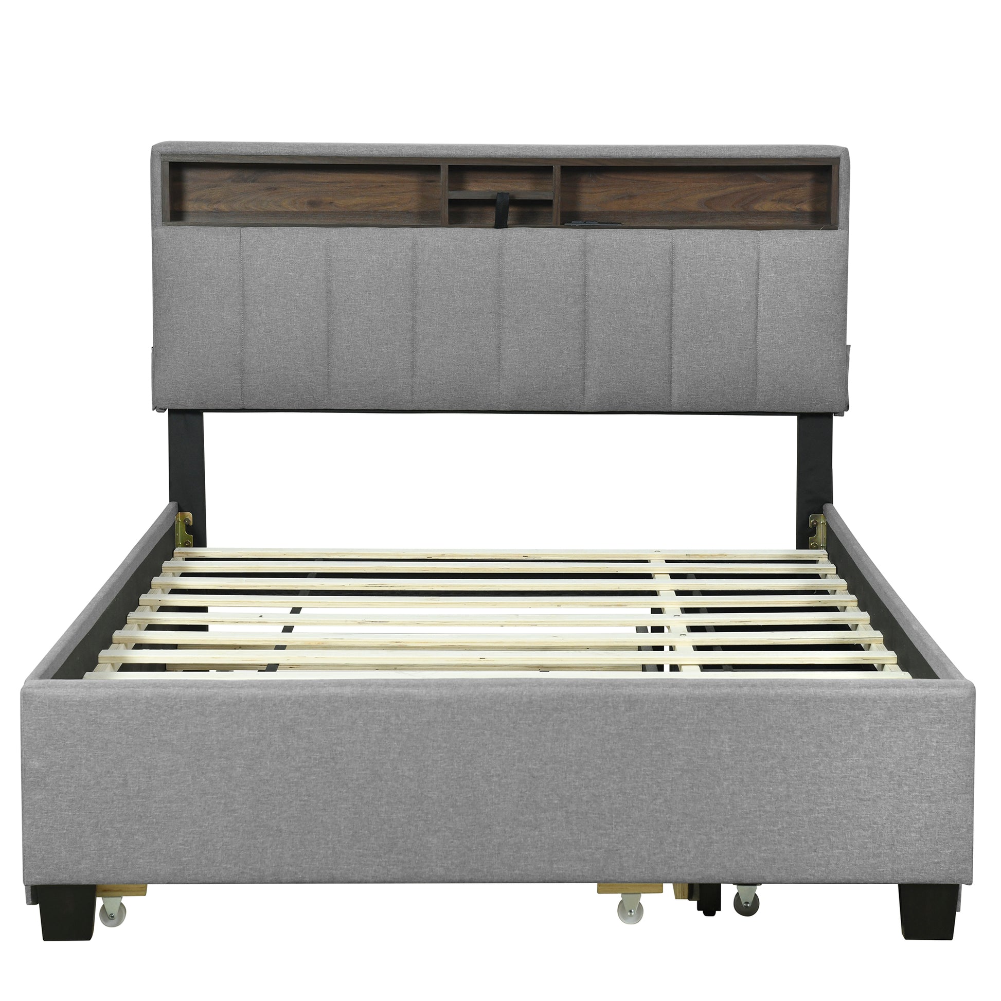 Grey upholstered queen bed frame with woodpaneled headboard shelves and rolling casters