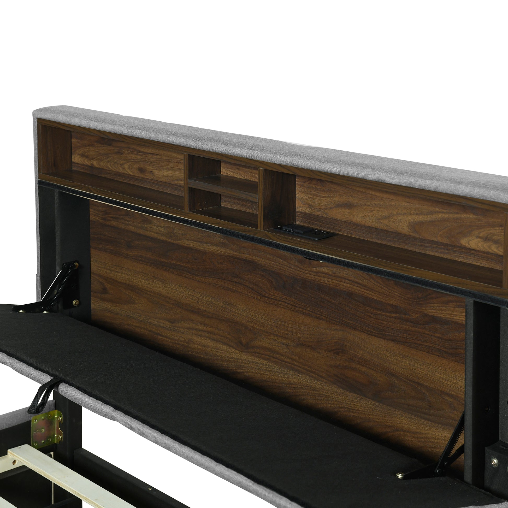 Grey upholstered bed frame with integrated walnut wood headboard storage