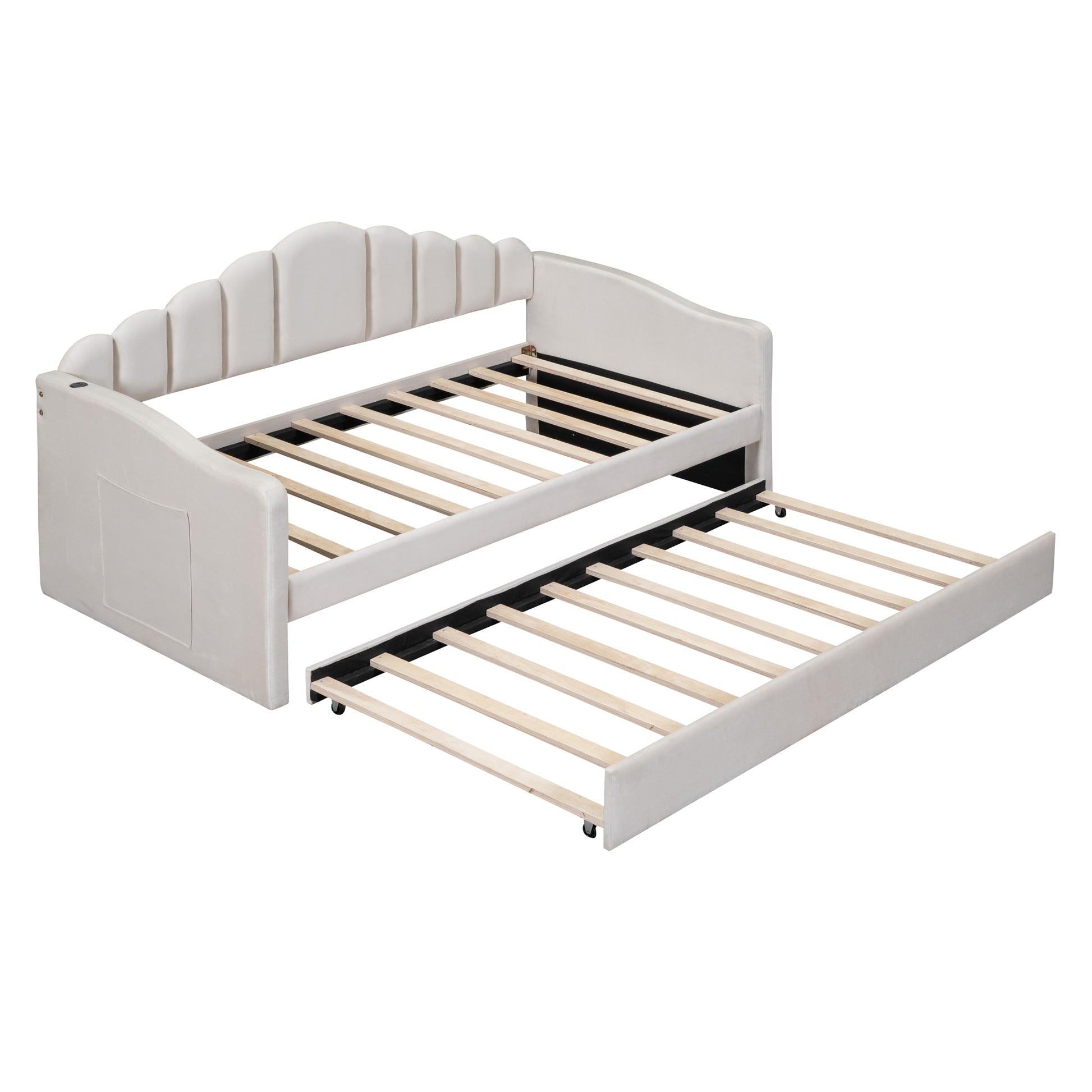 Cream velvet daybed with pullout trundle bed and scalloped headboard