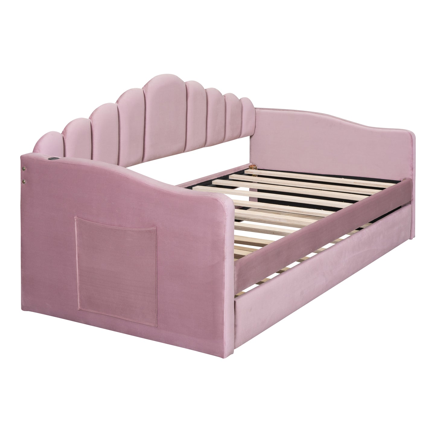 Pink velvet daybed with scalloped headboard and side pocket