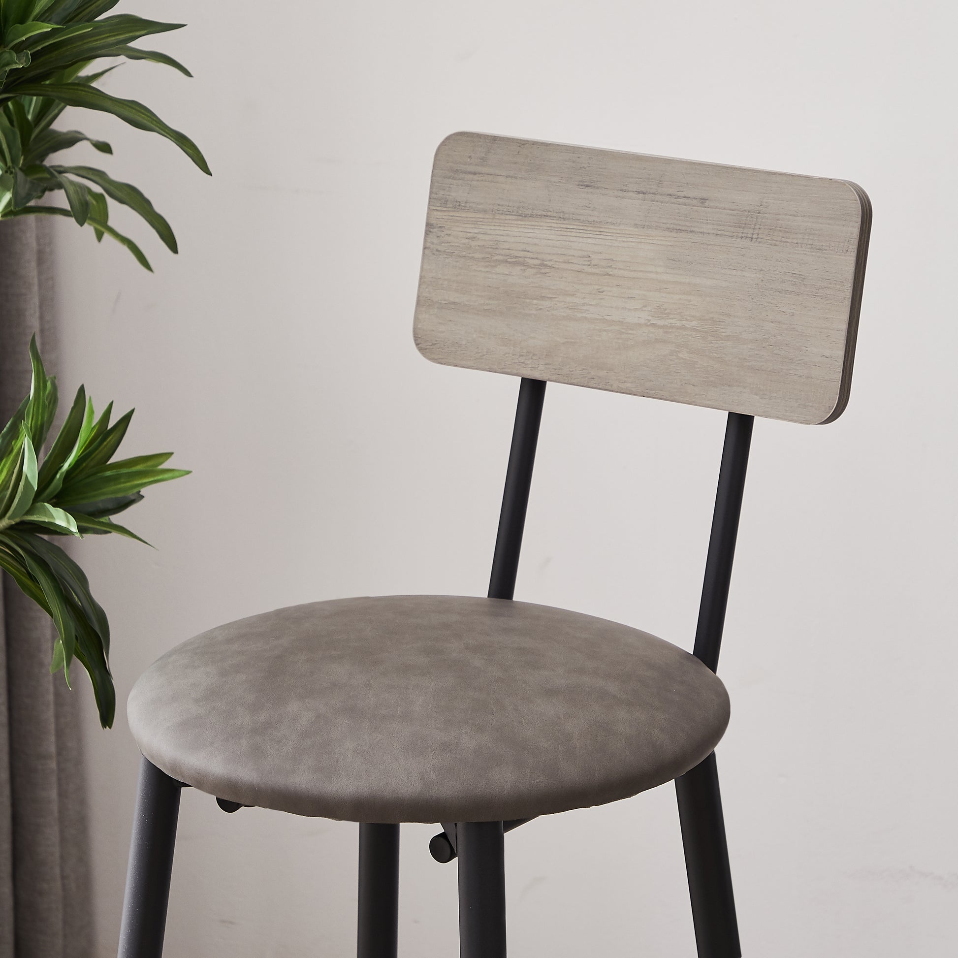 Gray faux leather bar stool with a light wood grain backrest