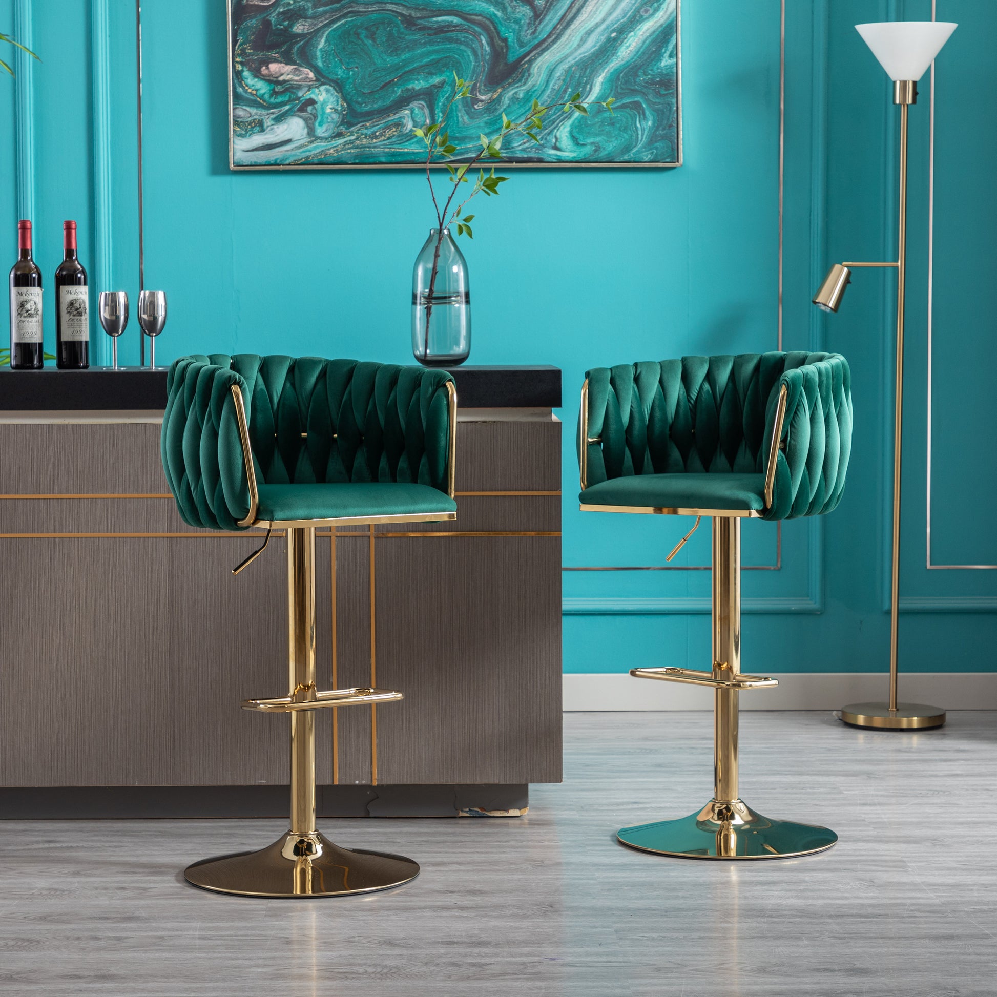 Emerald green velvet bar stool with tufted diamond pattern and gold accents