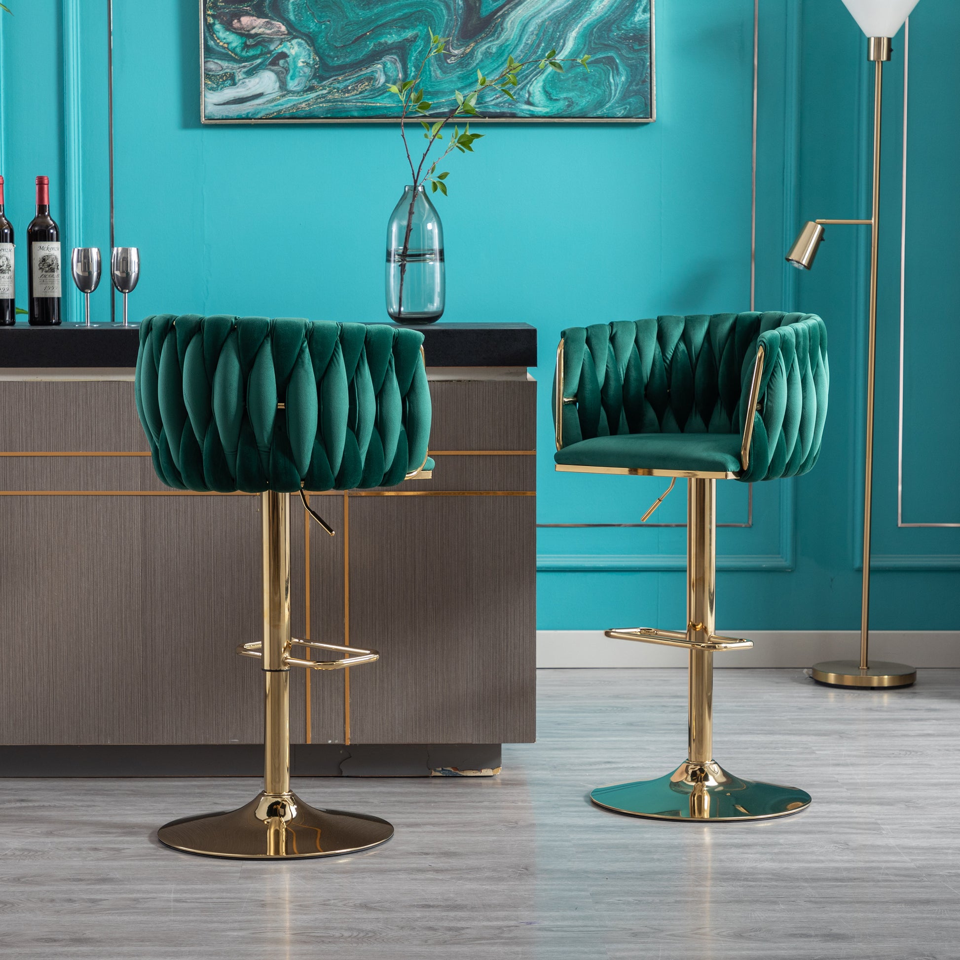 Emerald green velvet bar stool with gold accents and adjustable height