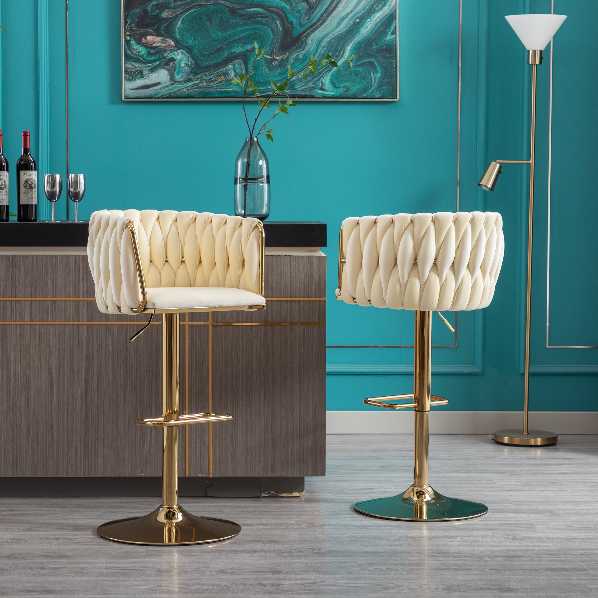 Cream velvet tufted bar stool with gold accents and adjustable height