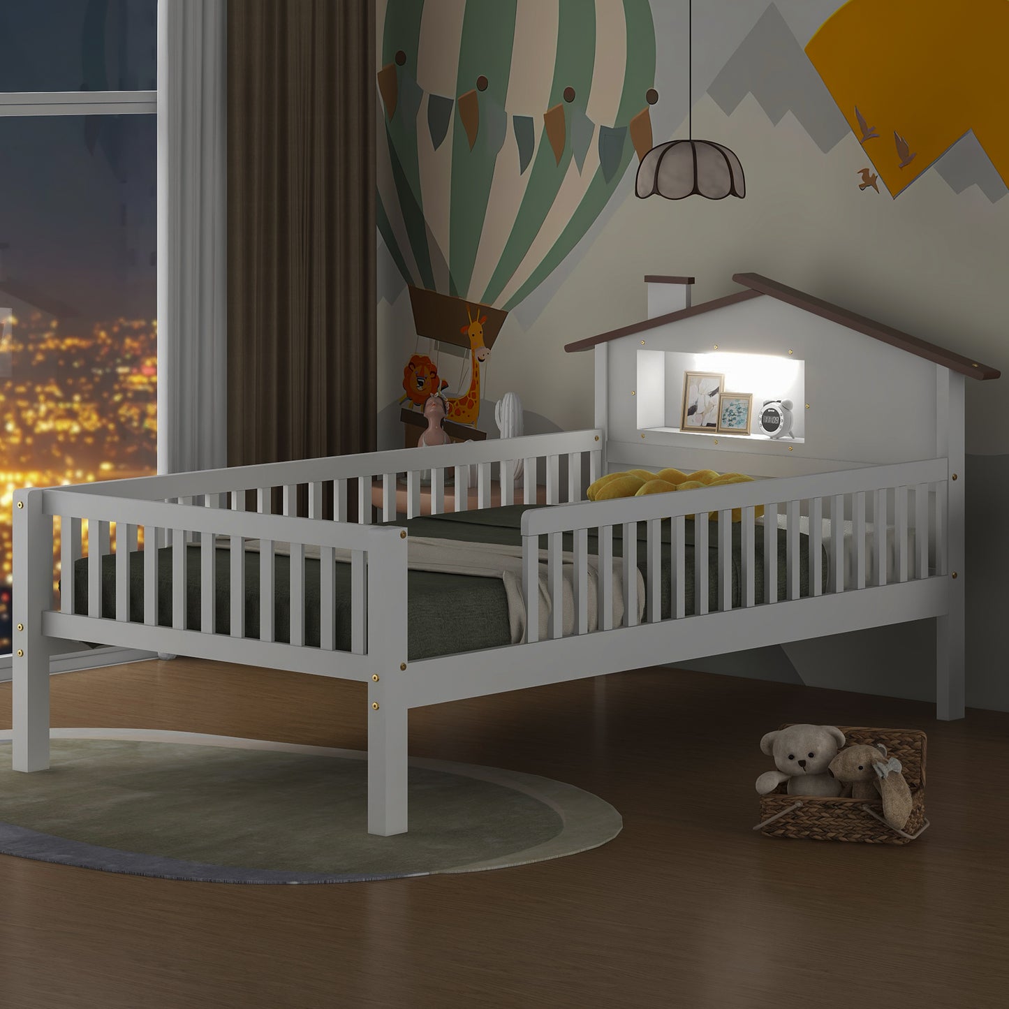 White wooden toddler bed with safety rails and a houseshaped headboard with builtin lights