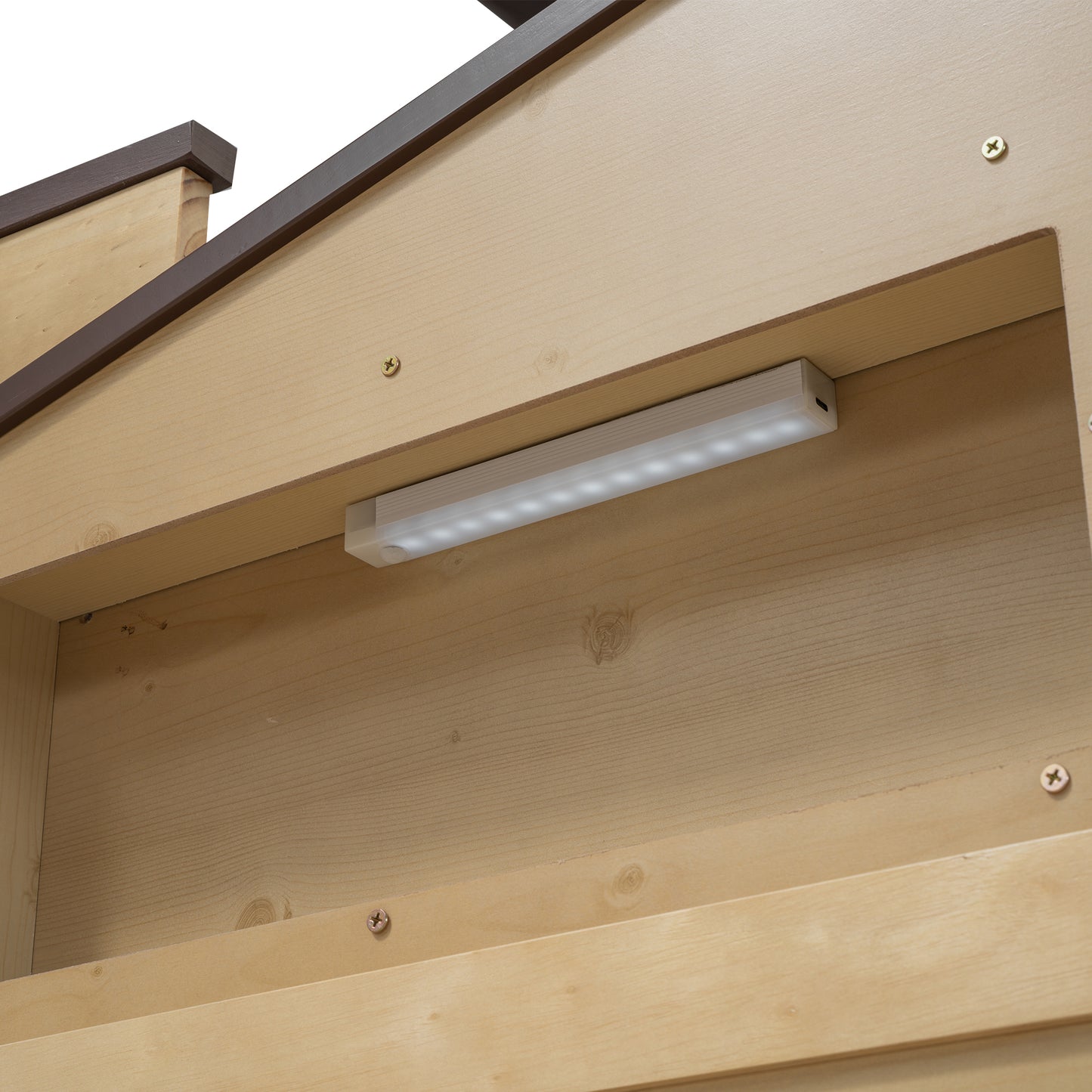 Wooden dog house interior detail with LED strip light