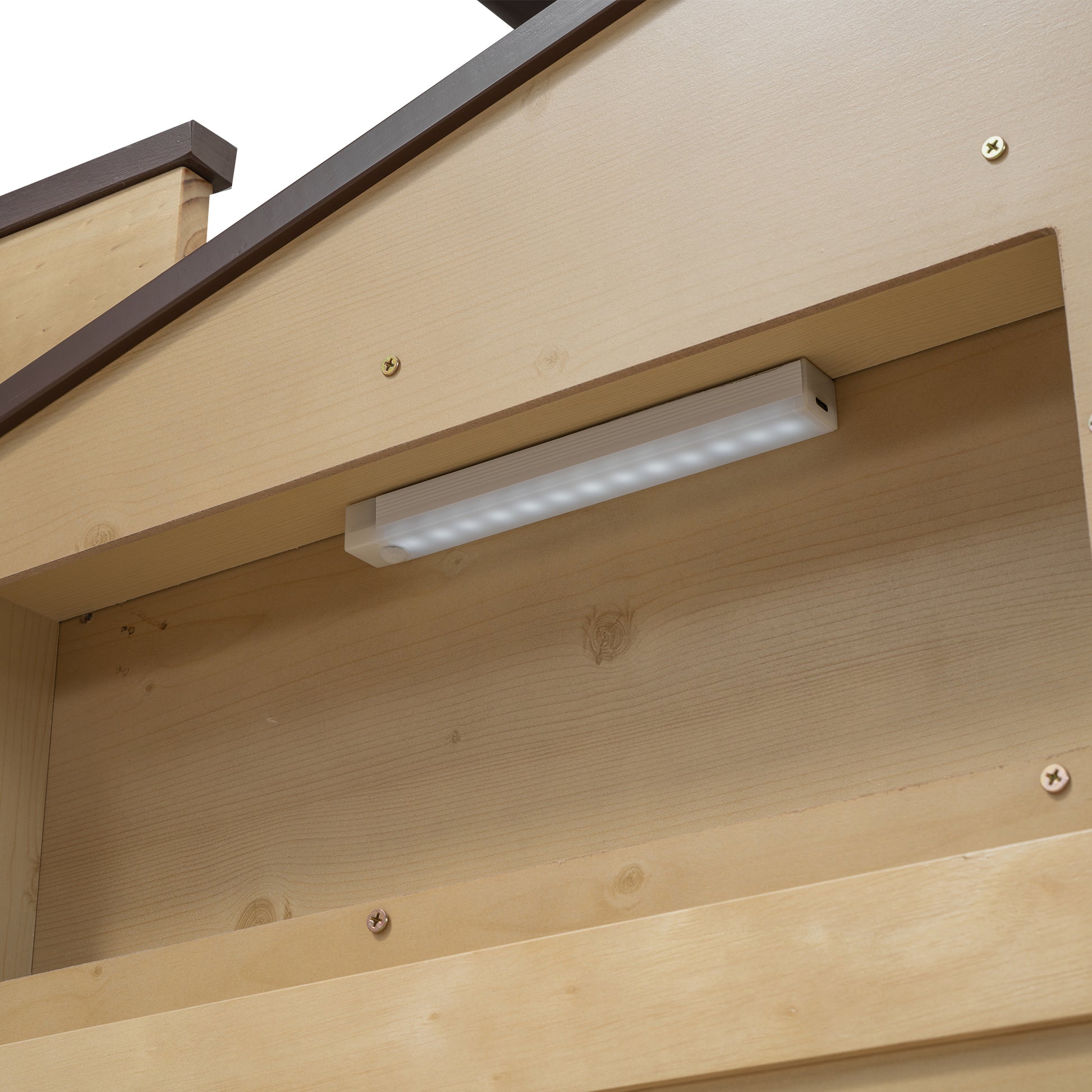 Wooden dog house interior detail with LED strip light