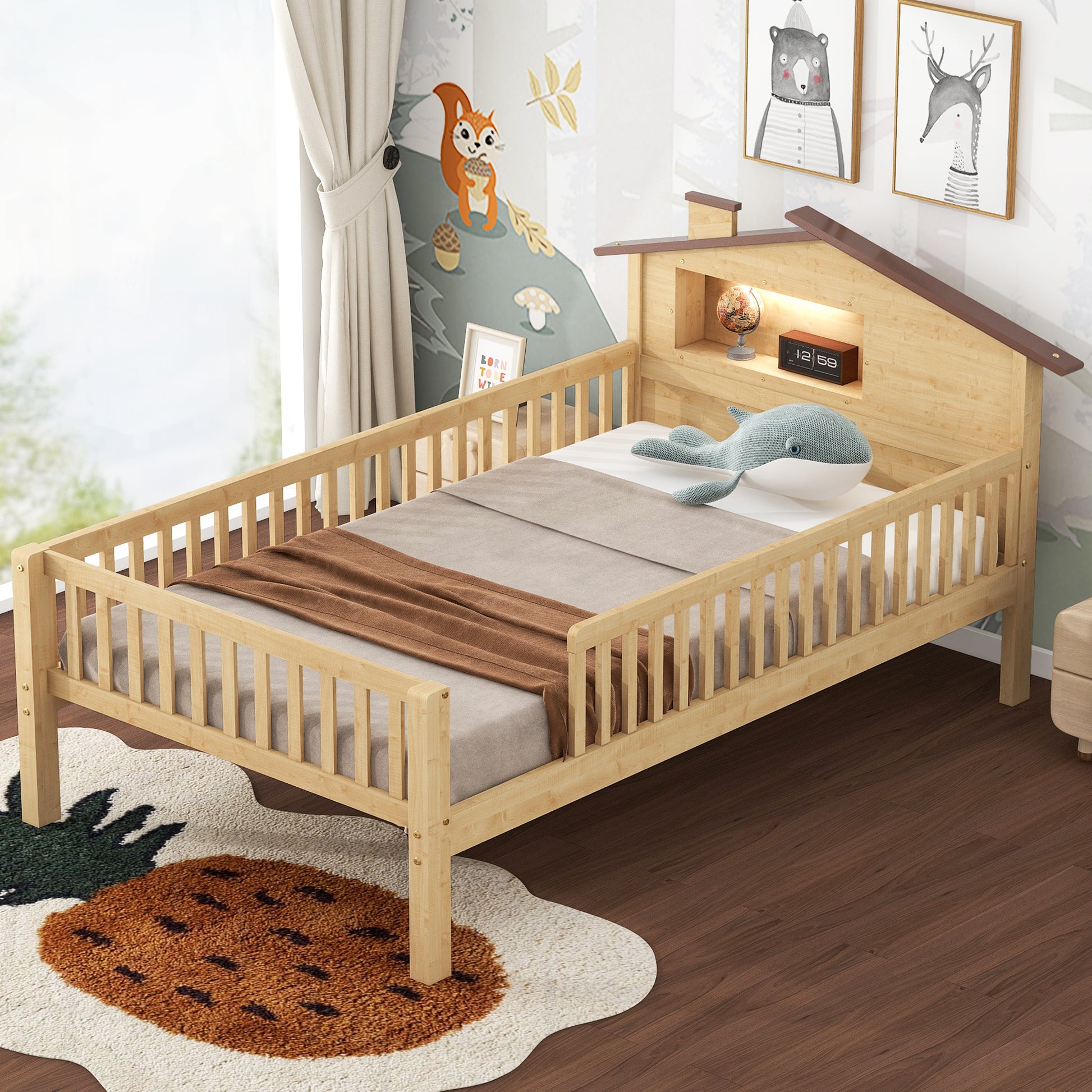 Wooden toddler bed with houseshaped headboard and playful animal art
