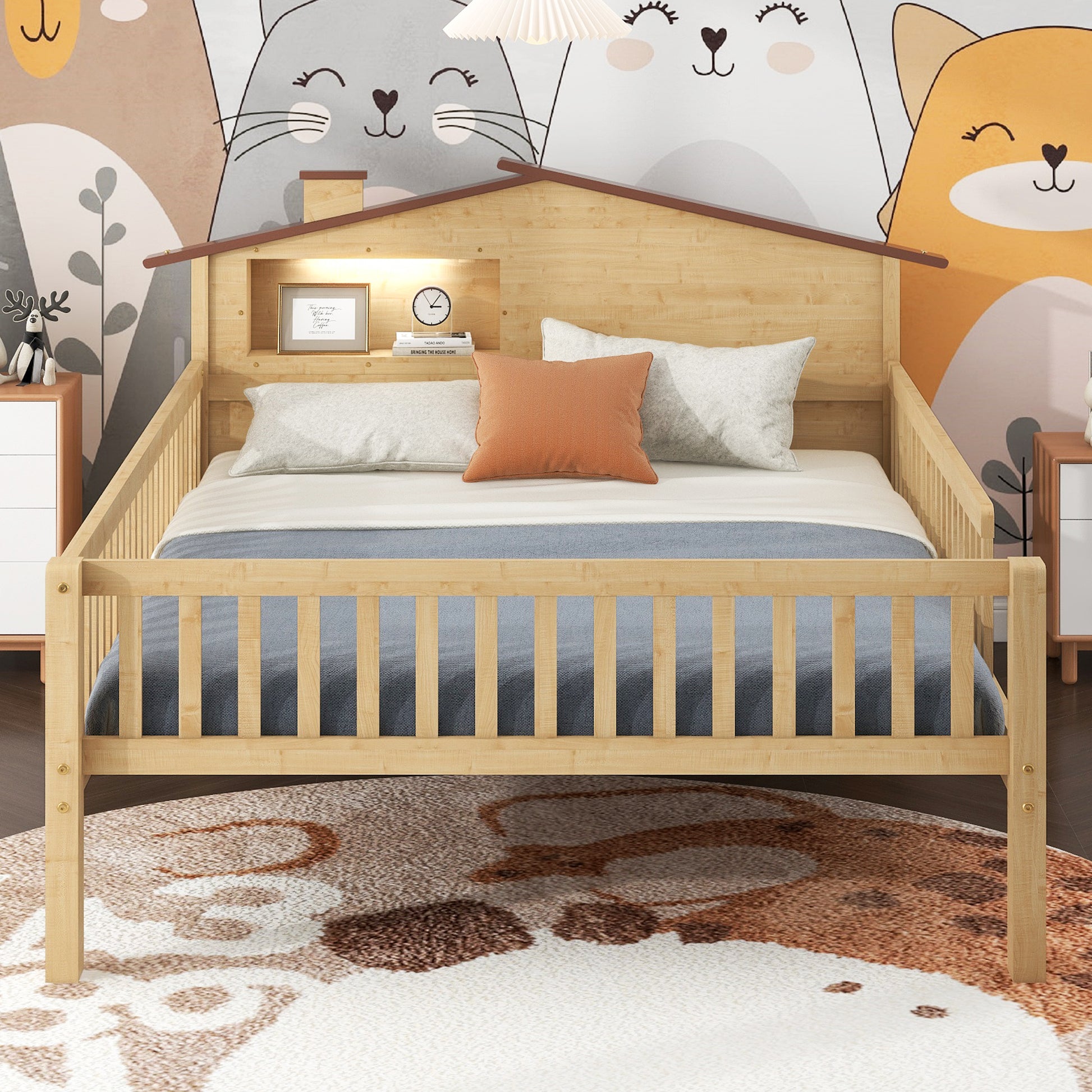 Natural wood toddler bed with houseshaped headboard and builtin shelves