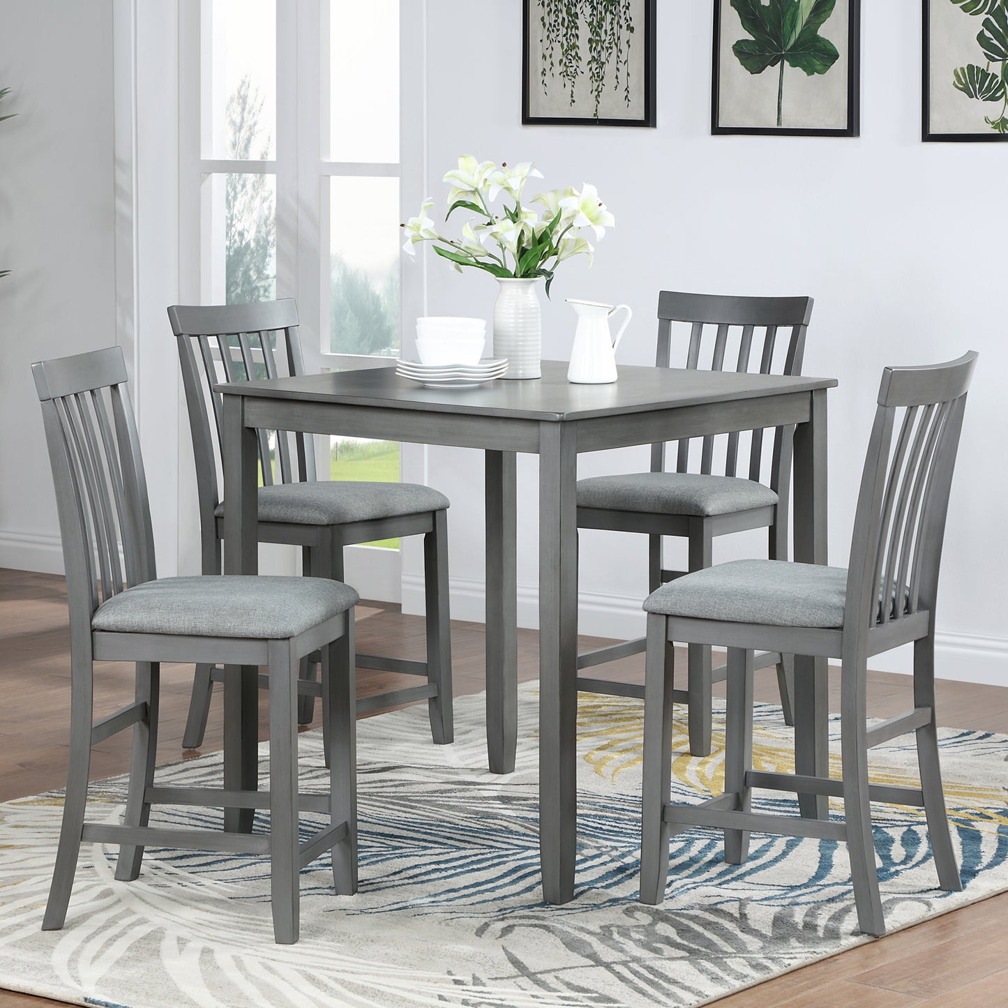 Gray counter height dining set with four padded stools