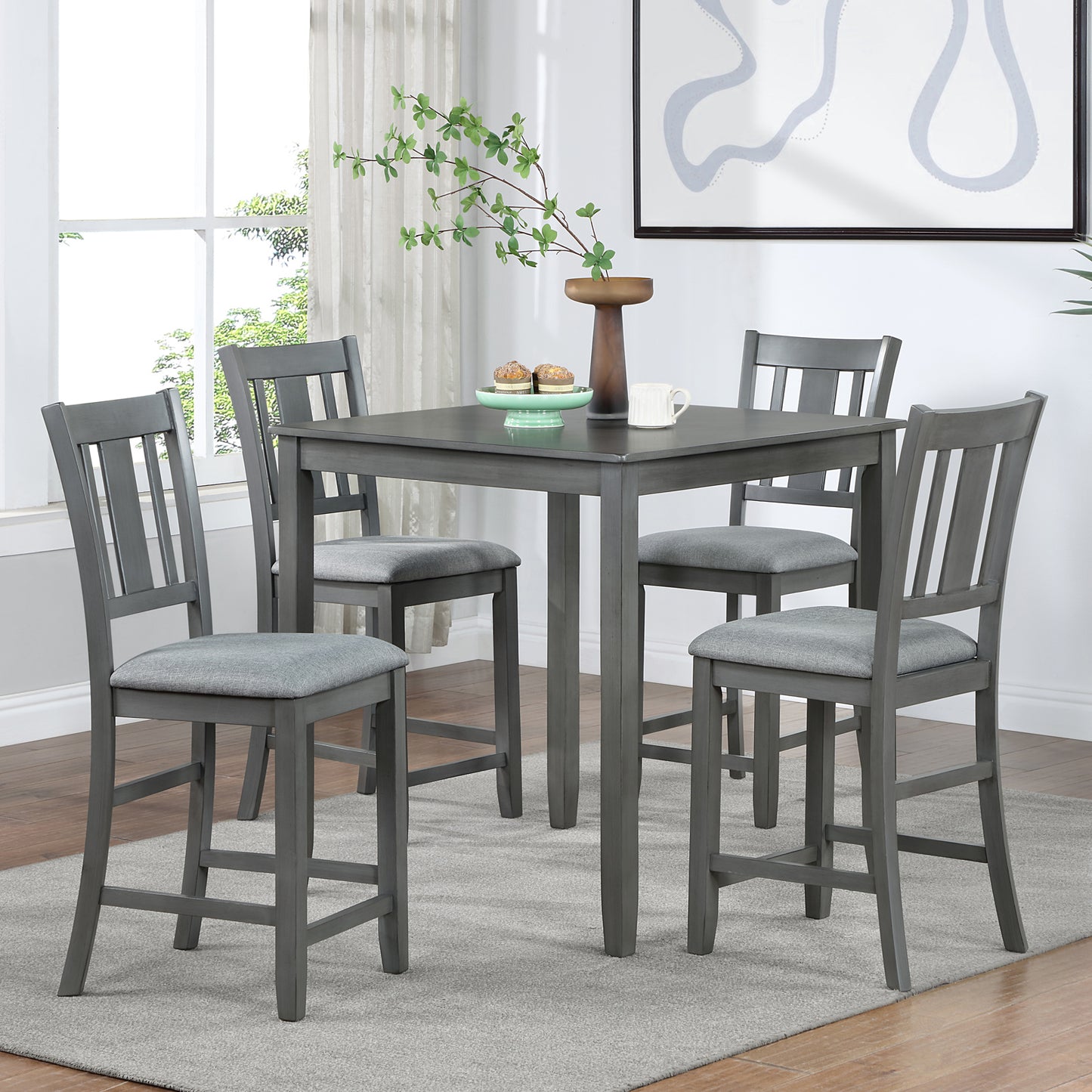 Gray counter height table and four upholstered stools with slatted backs