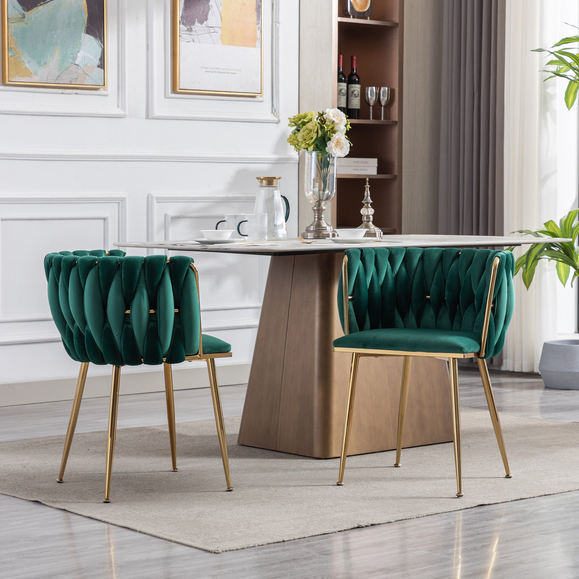 Emerald velvet dining chair with gold metal legs and quilted detail
