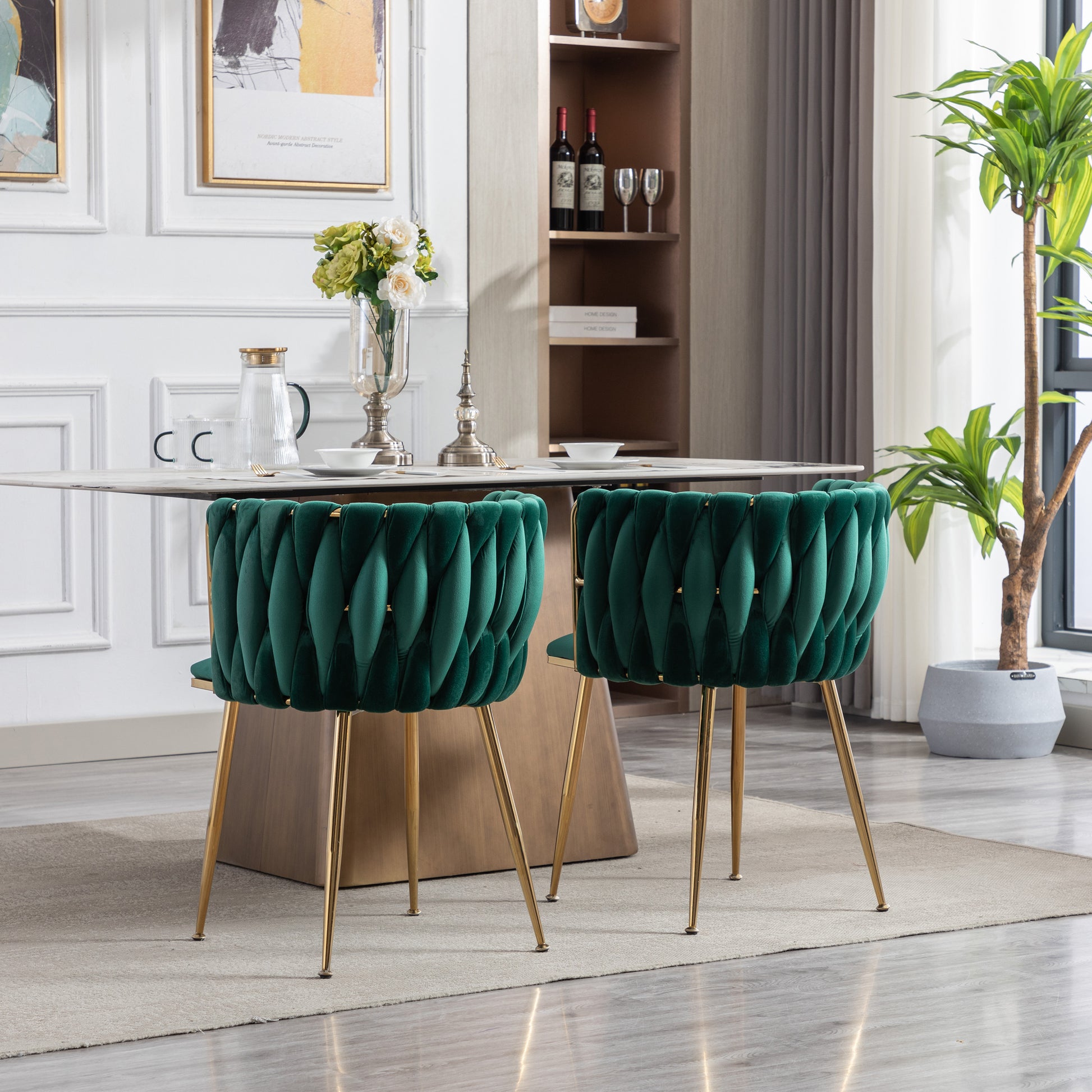 Emerald velvet accent chair with tufted design and gold legs