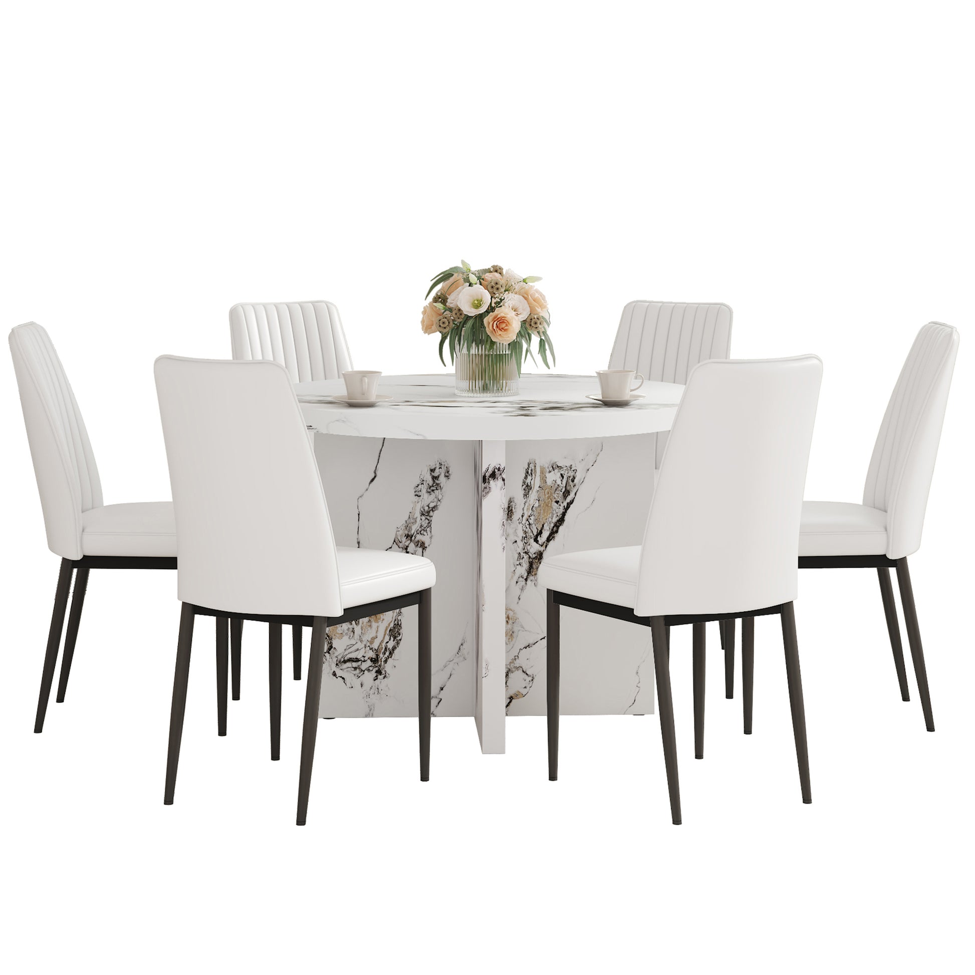 White upholstered dining chairs surround a white marble pedestal dining table with floral centerpiece