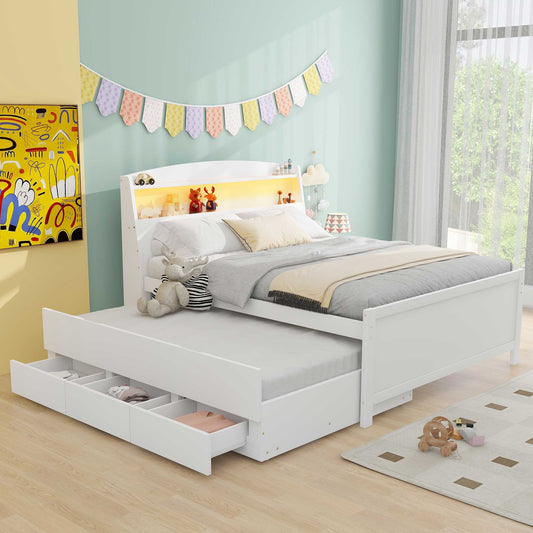 White twin bed with trundle and storage drawers featuring a lighted headboard shelf for toys