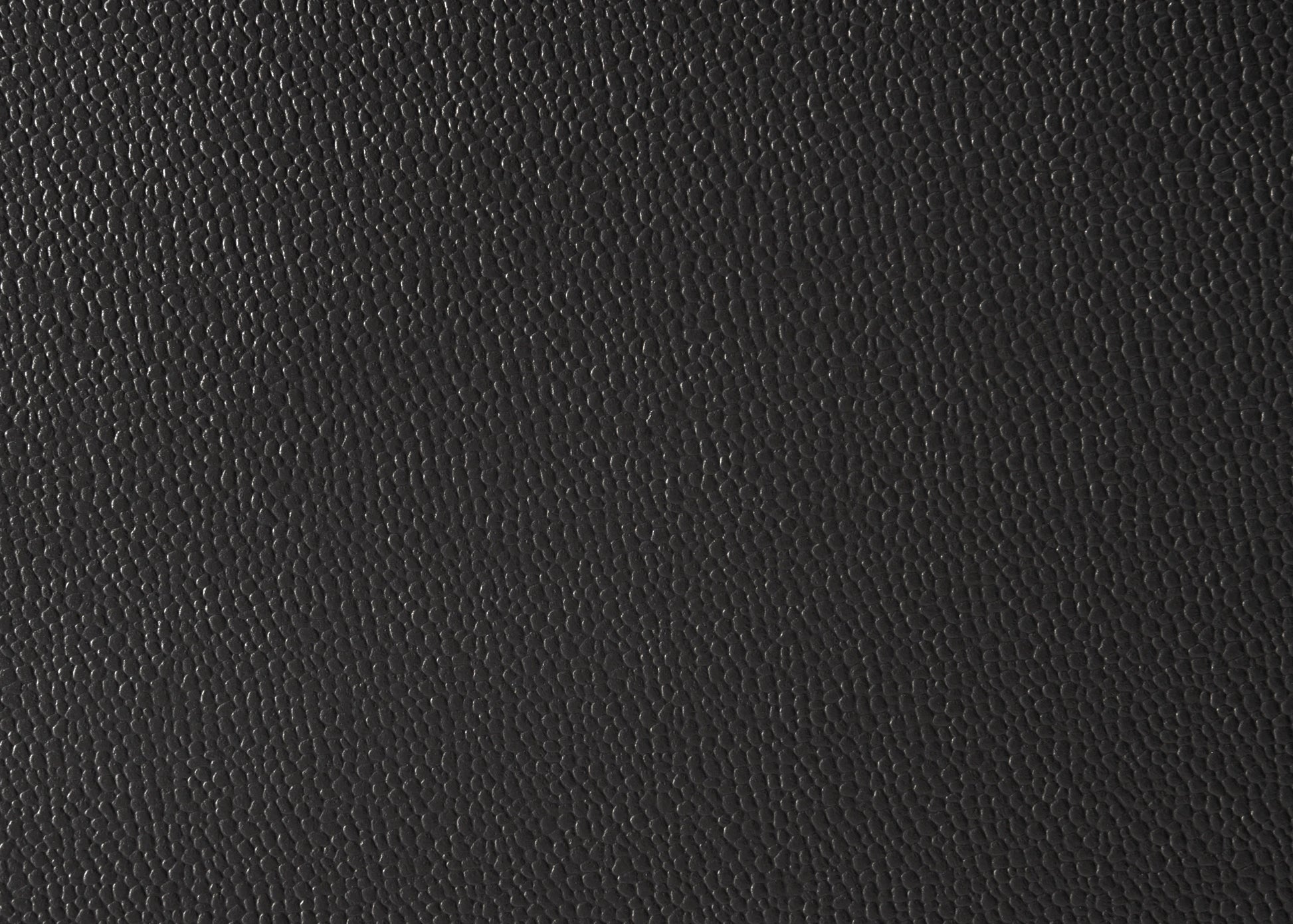 Black textured faux leather upholstery fabric