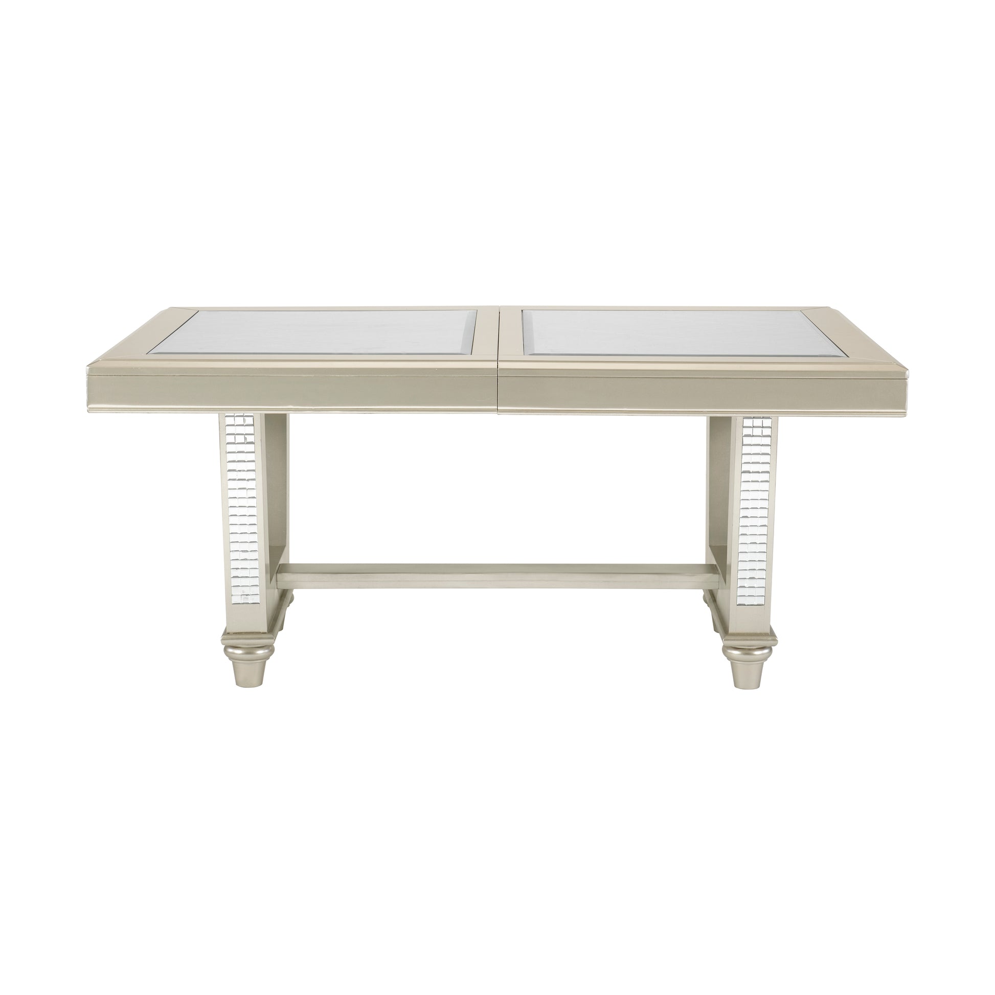 Glam dining table with mirrored top and silver legs