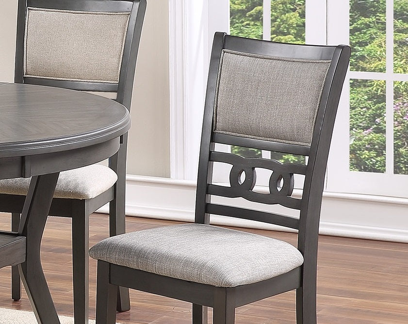 Dark gray upholstered dining chair with geometric back design