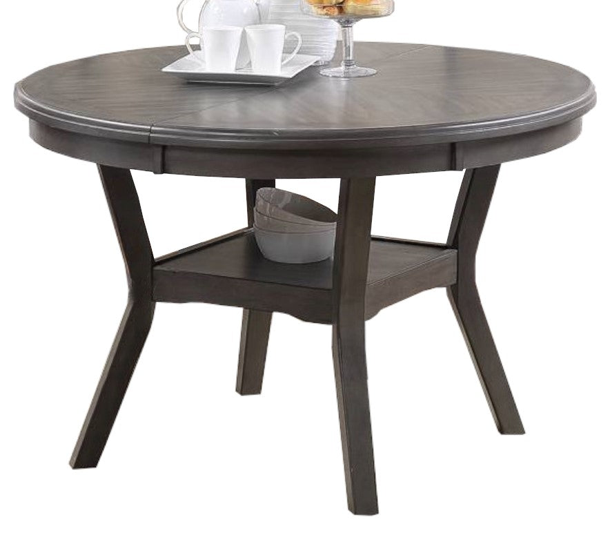 Gray round dining table with twotier shelf and minimalist design