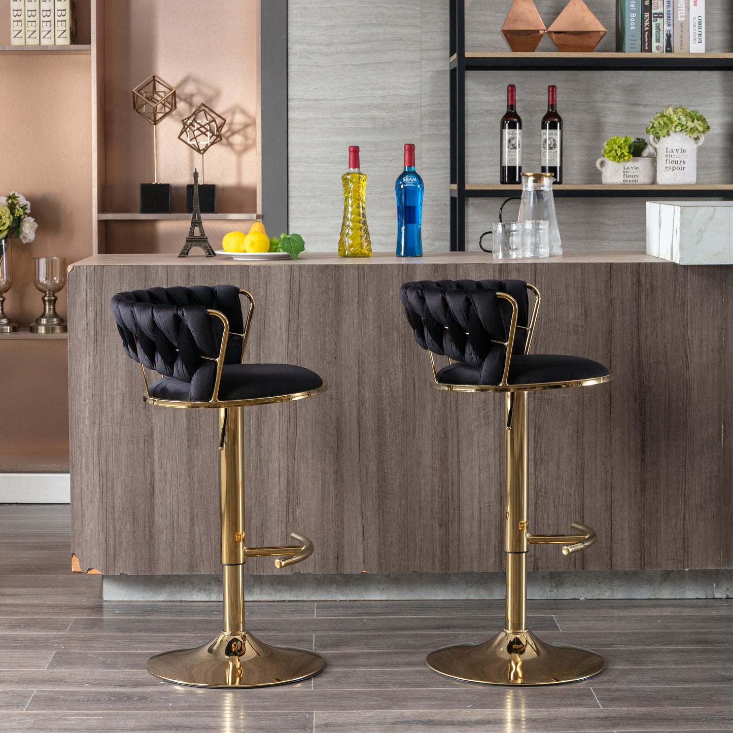 Black velvet bar stool with tufted backrest and gold base