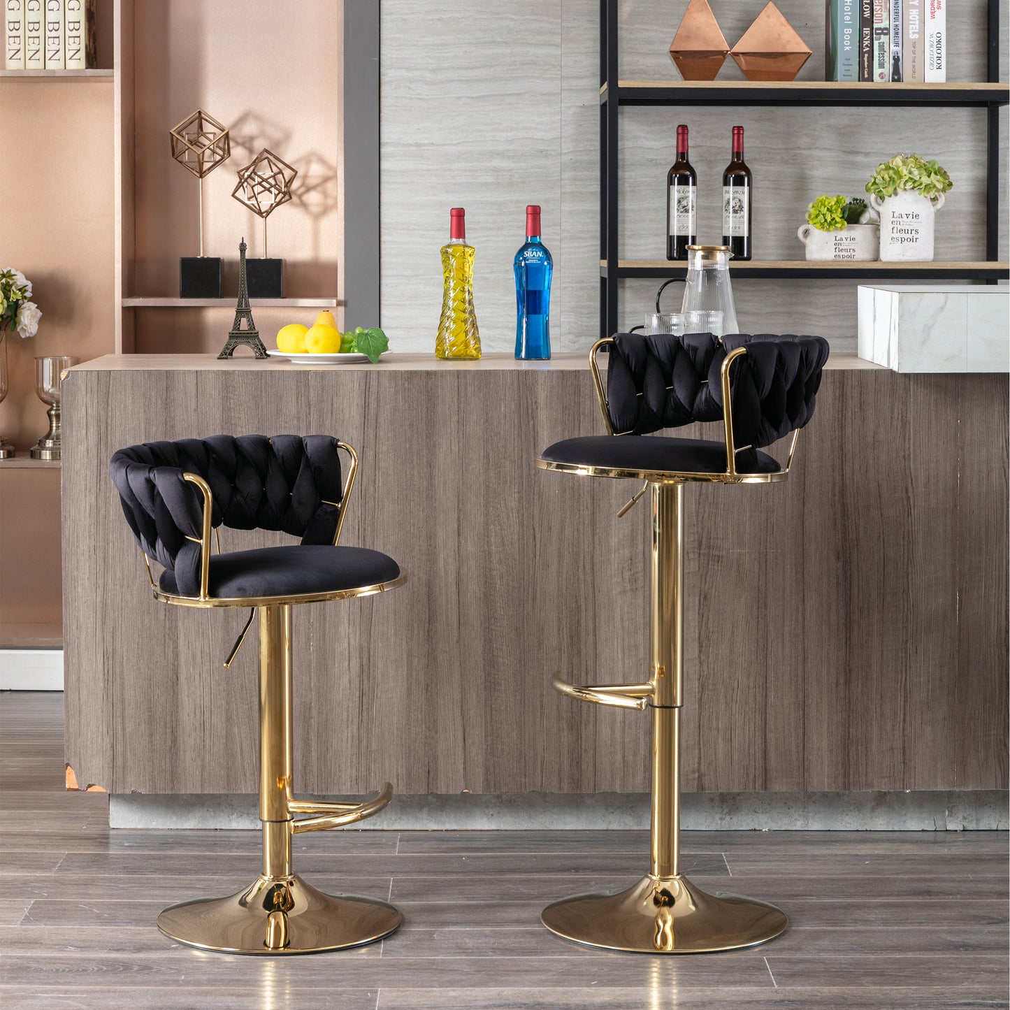 Black velvet tufted bar stool with gold metal frame and base