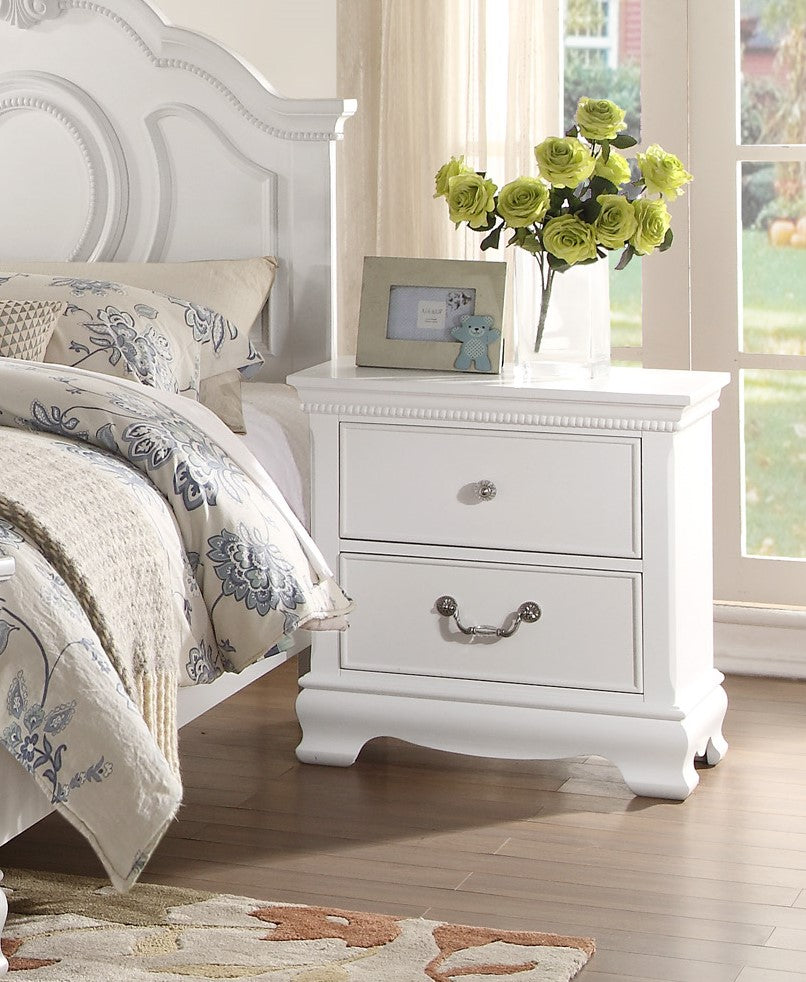 White twodrawer nightstand with ornate silver hardware and carved detailing