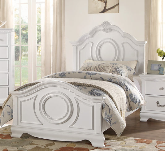 Elegant white twin bed with ornate headboard and footboard