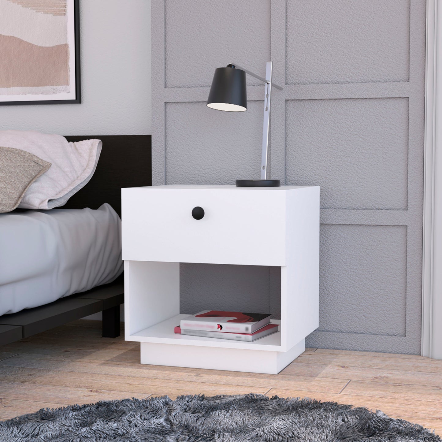 Modern white bedside table with a drawer and open shelf