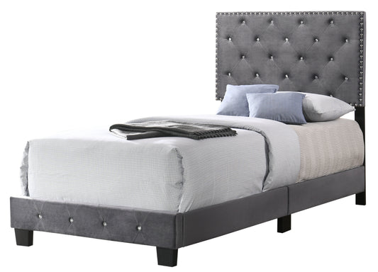 Grey velvet twin bed with crystal tufting and nailhead trim headboard
