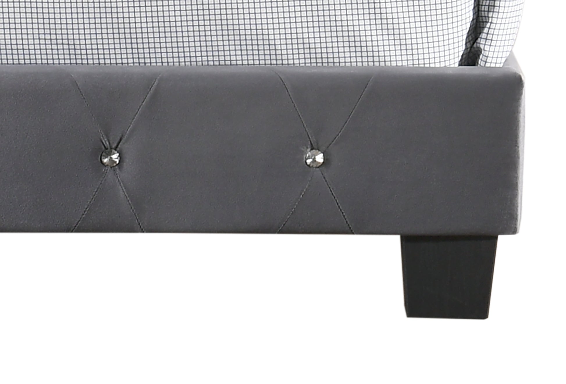 Dark gray tufted upholstered bed frame with crystal accents