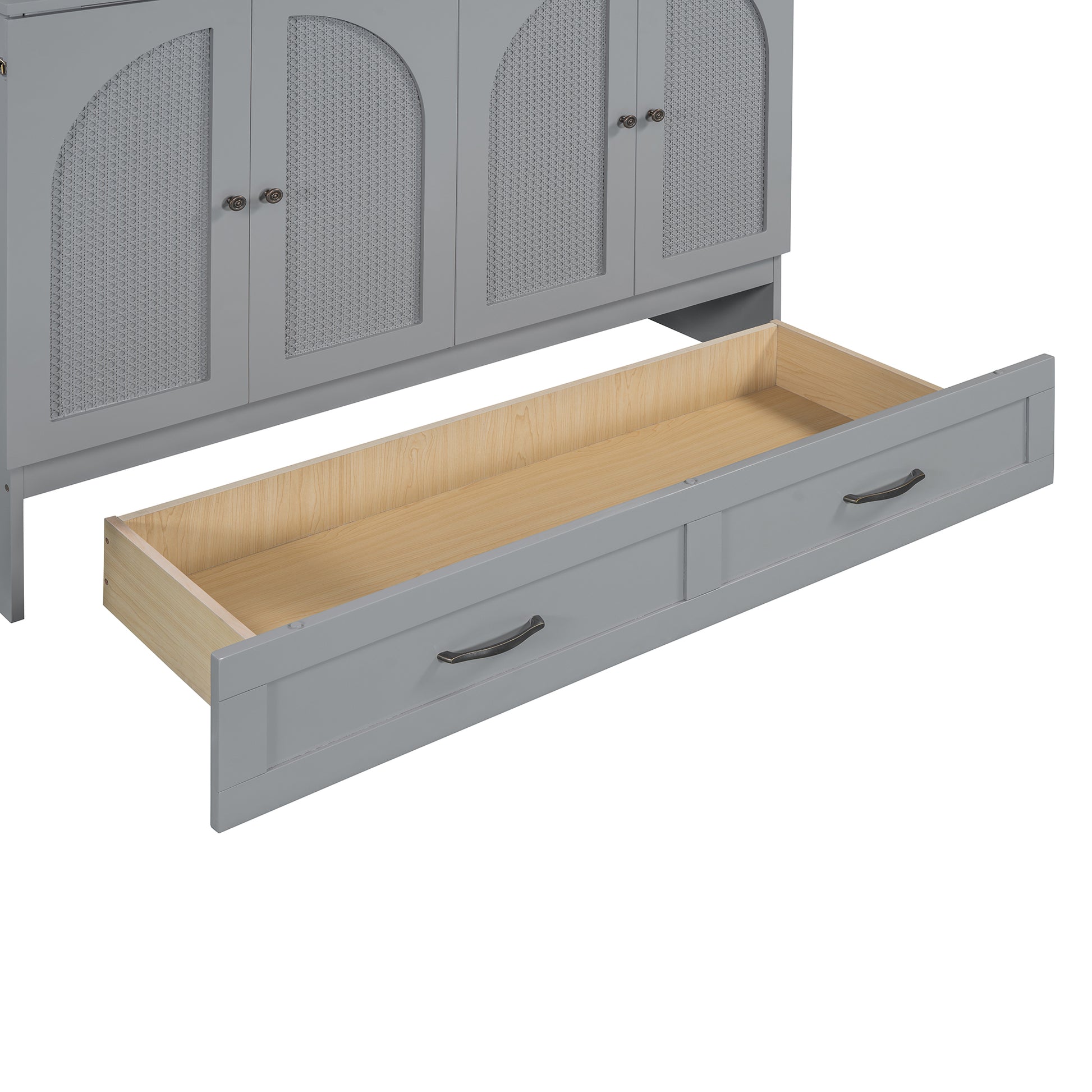 Gray cane accent cabinet with one open drawer showing pine interior