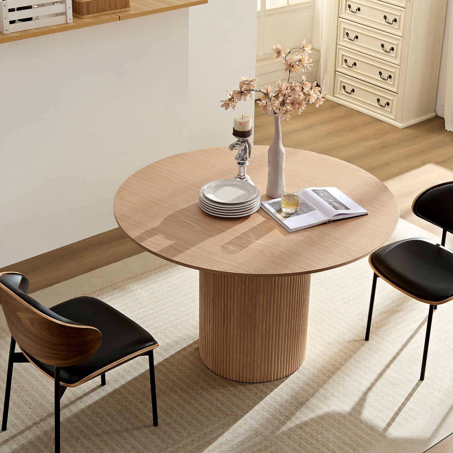 Round oak dining table with fluted base