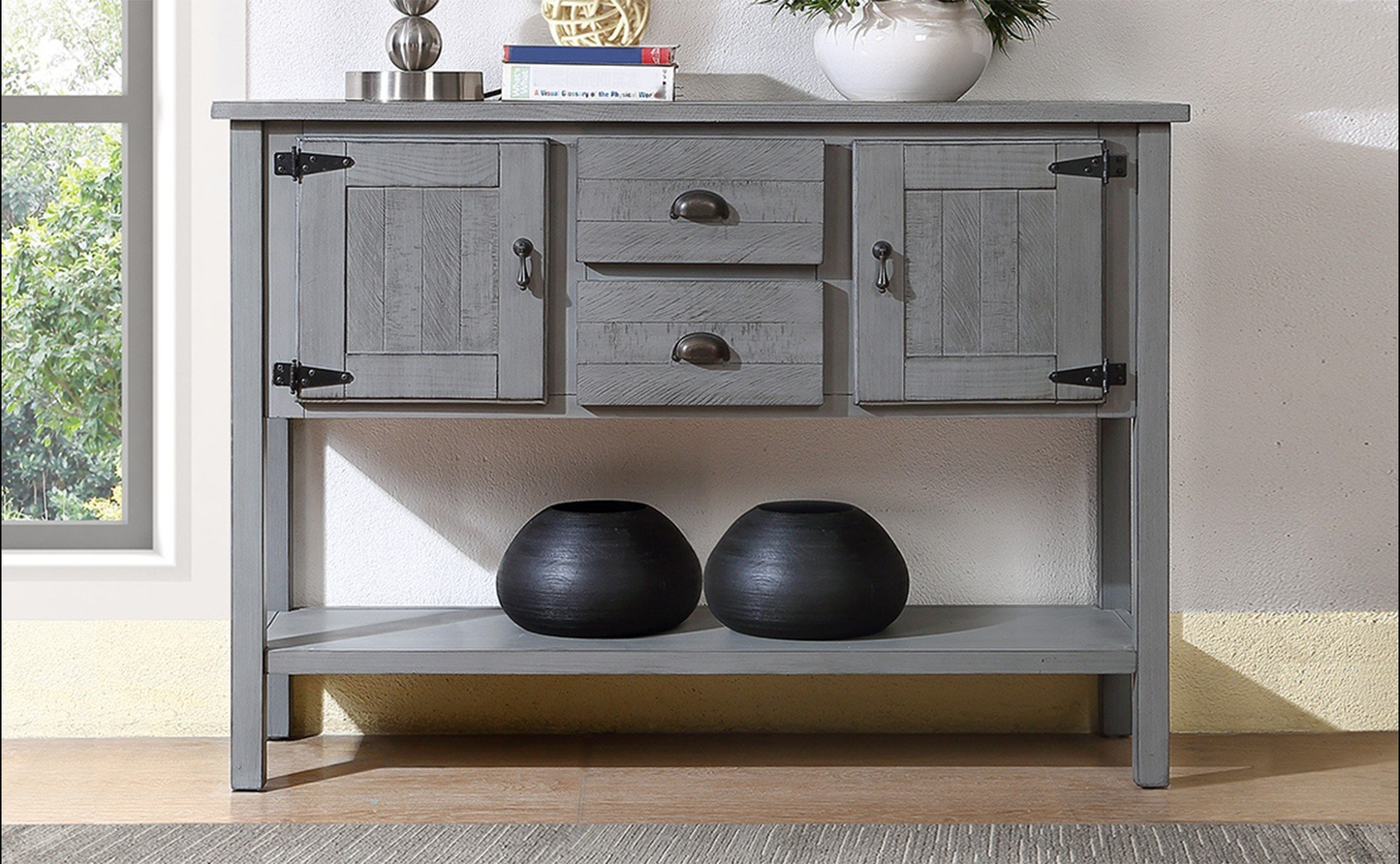 Gray wooden entryway console table with two drawers and two cabinet doors