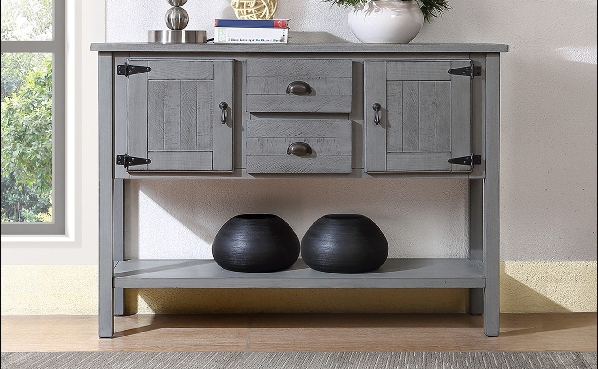 Gray wooden entryway console table with two drawers and two cabinet doors