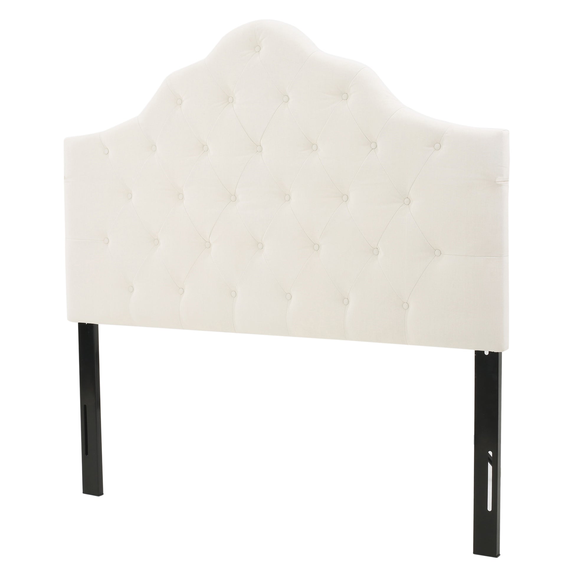 Cream upholstered tufted headboard with black legs