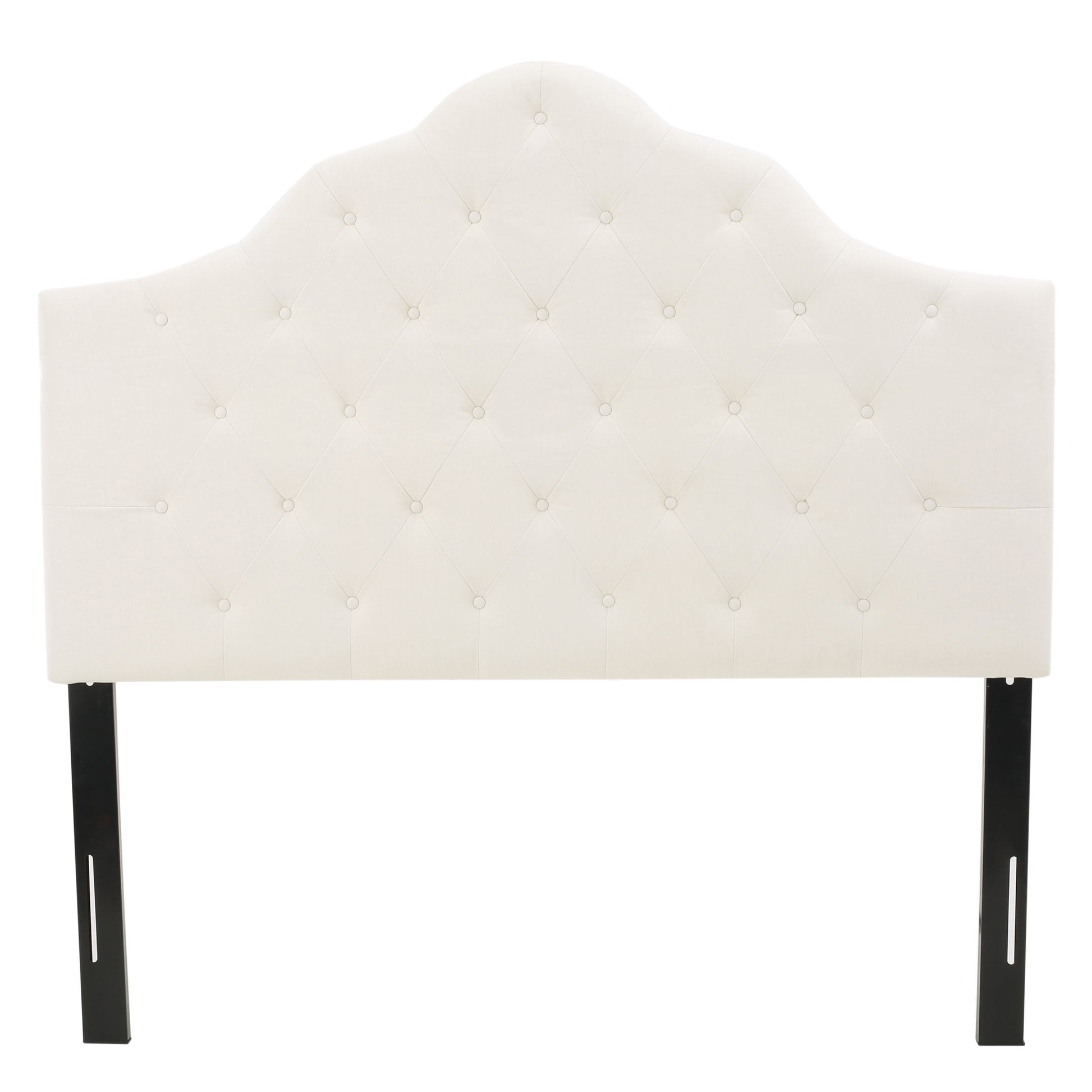 Cream tufted headboard with curved top and black legs