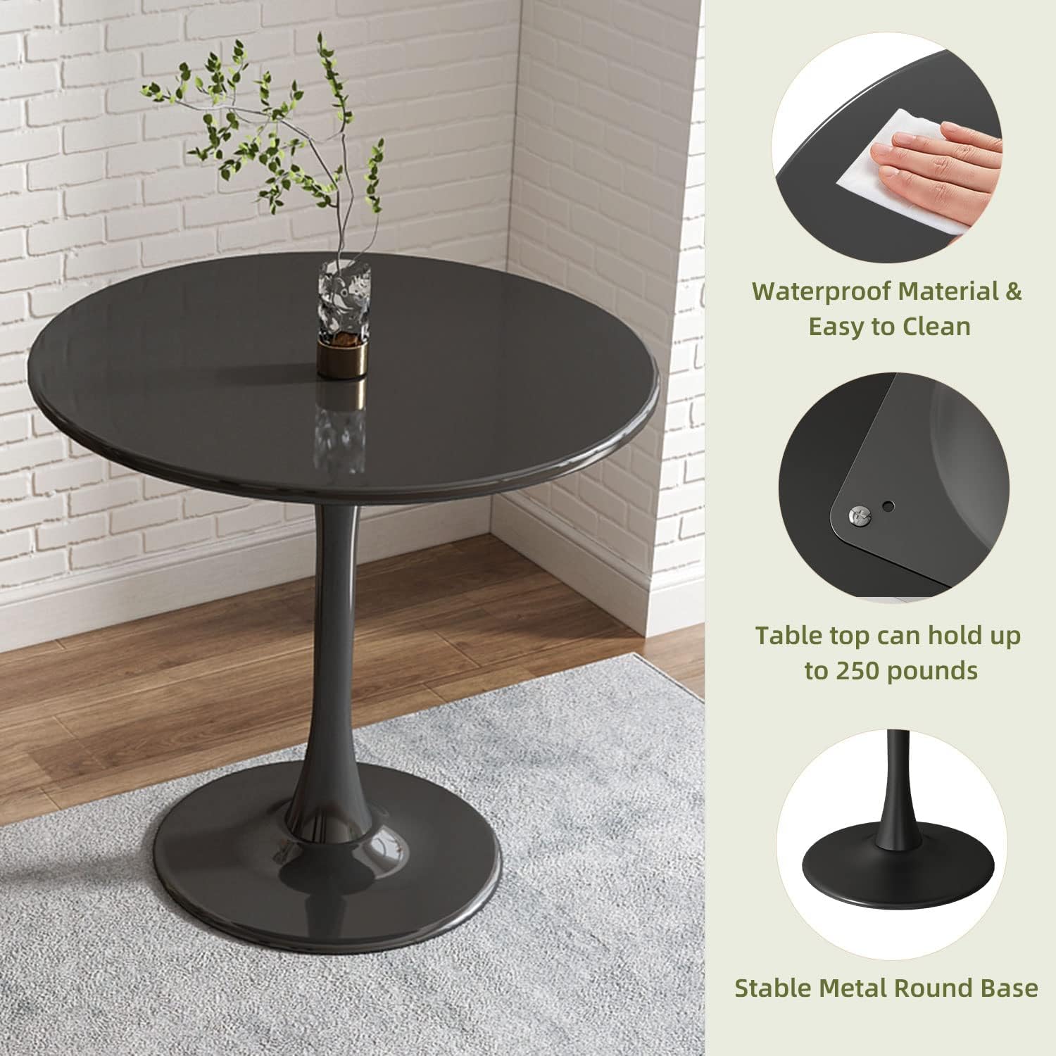 Dark gray round pedestal dining table with faux plant