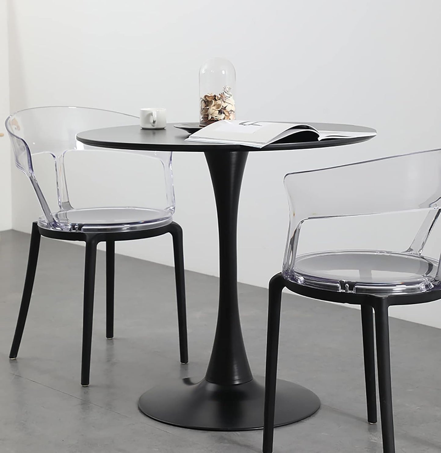 Modern clear acrylic dining chair with black legs