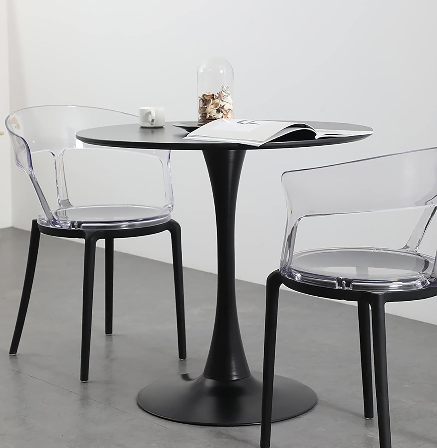 Modern clear acrylic dining chair with black legs